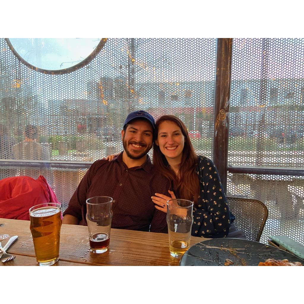 At our favorite brewery in Houston, celebrating our engagement with friends, January 2020