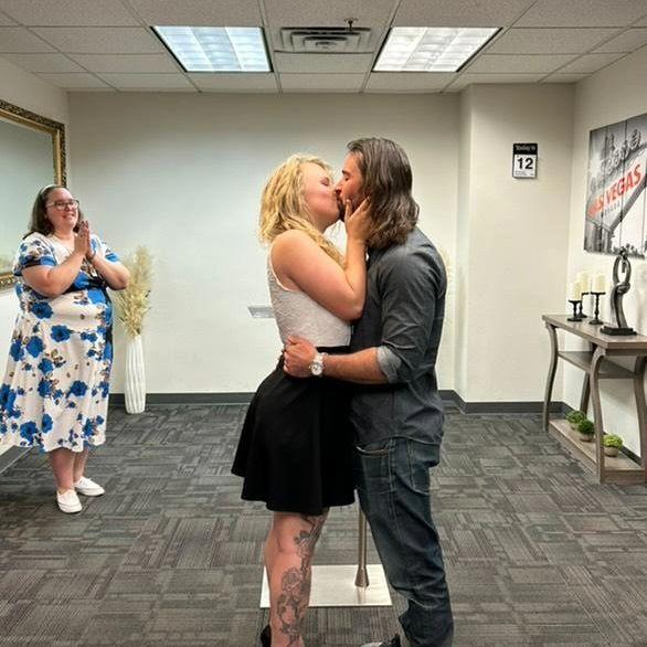 We said "I do" in the presence of our best friend and the county clerk (who obviously loves her job!).