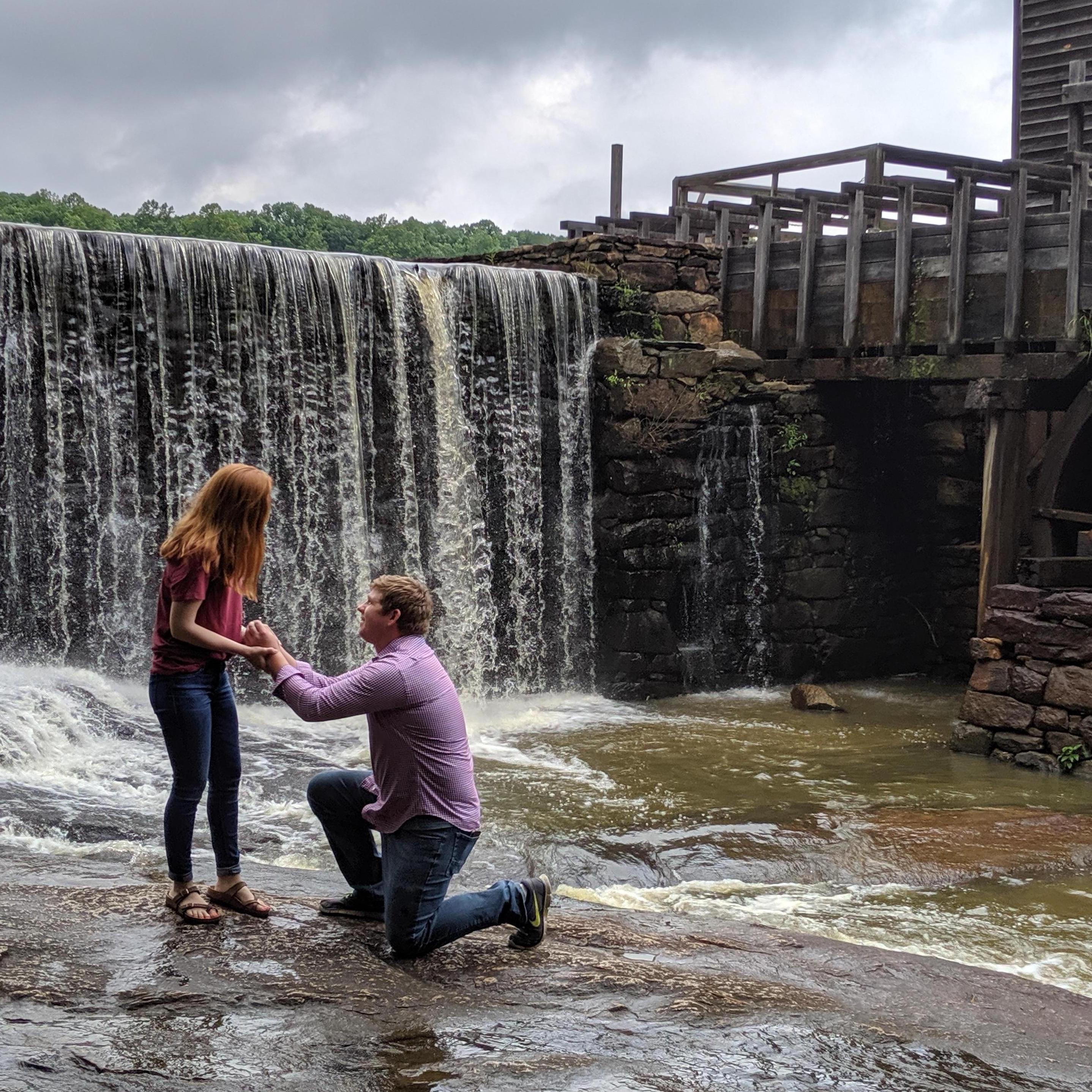 Mark surprises Amanda by getting down on one knee at a beautiful old mill in North Carolina!