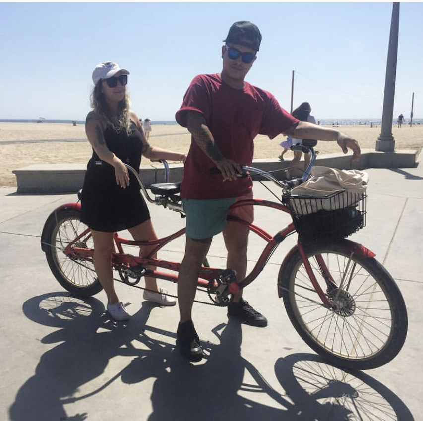 On the Venice Beach boardwalk right after we moved to California. Diego did all of the pedaling.