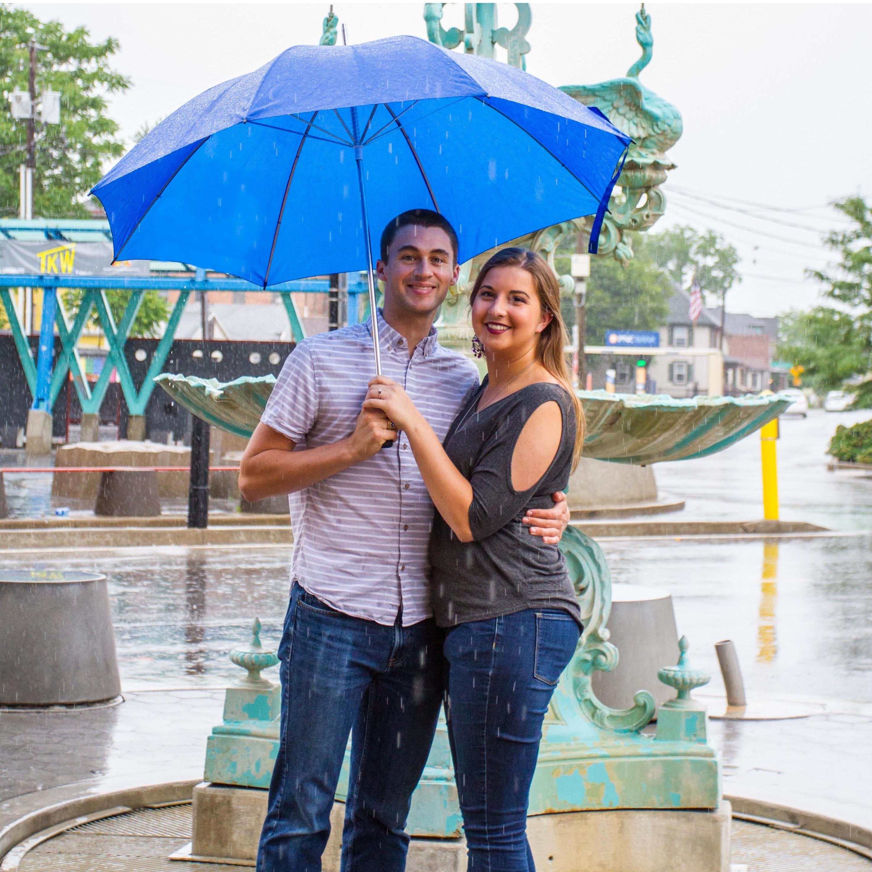 A little rain definitely added some character to our engagement photo session with Adam!