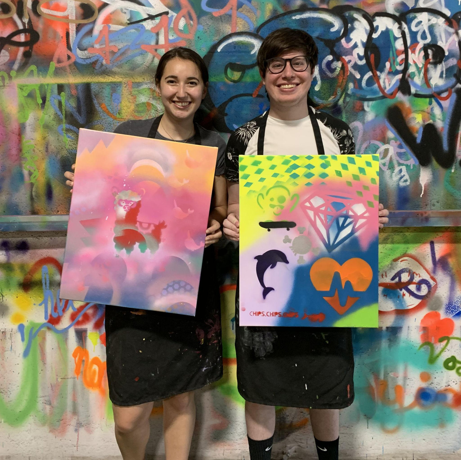 Showing off our masterpieces from a sip and paint class