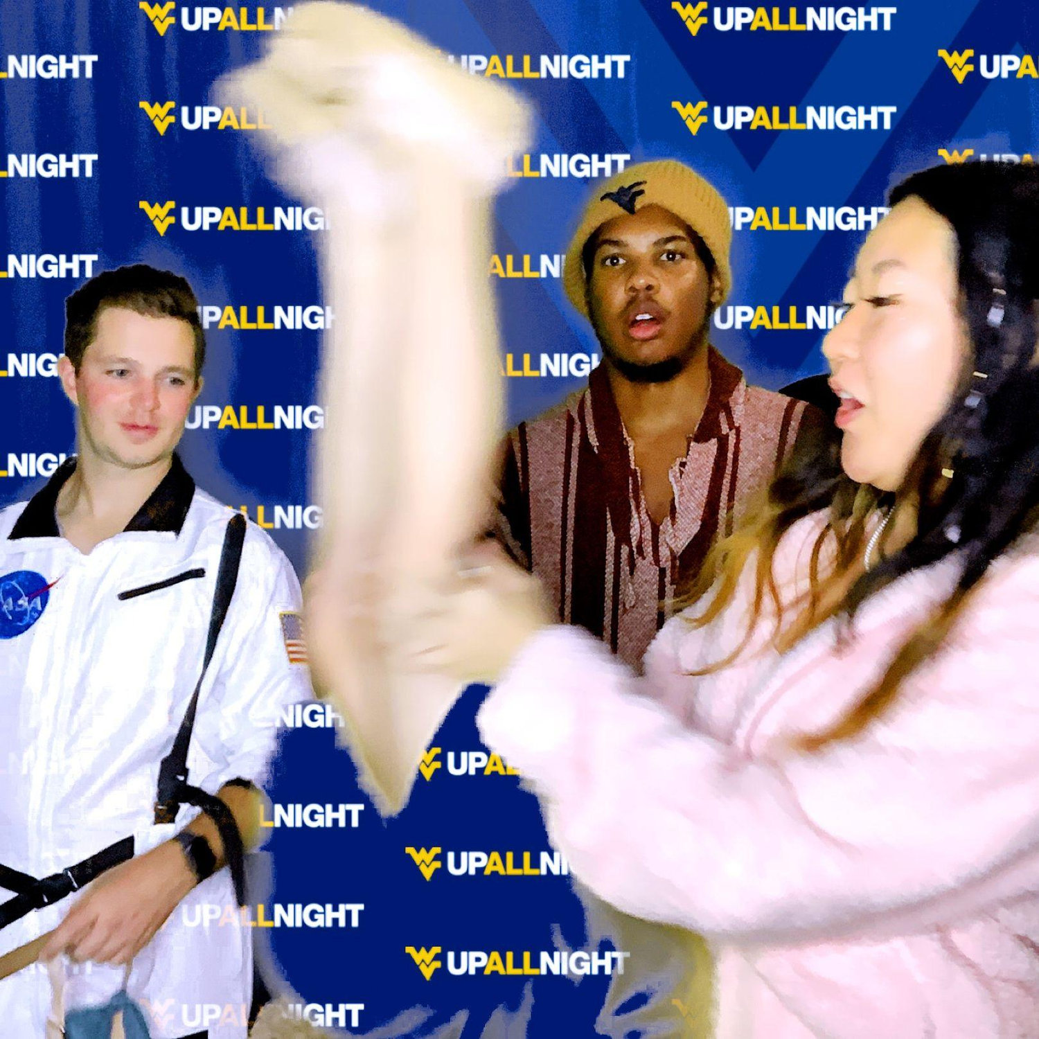 Andy experiencing my famous WVU Up All Night handstand for the first time.