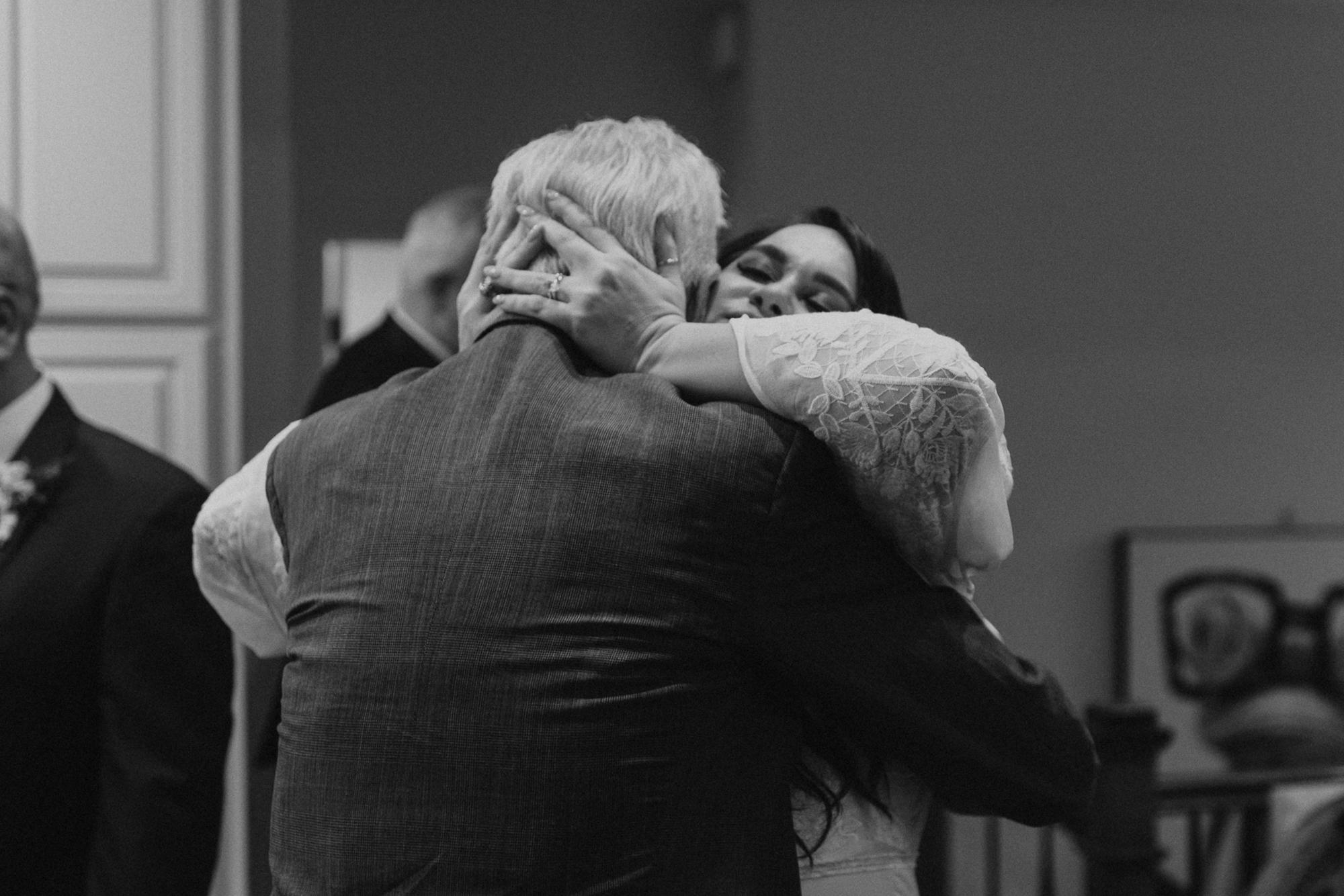 Hugs for the father of the groom