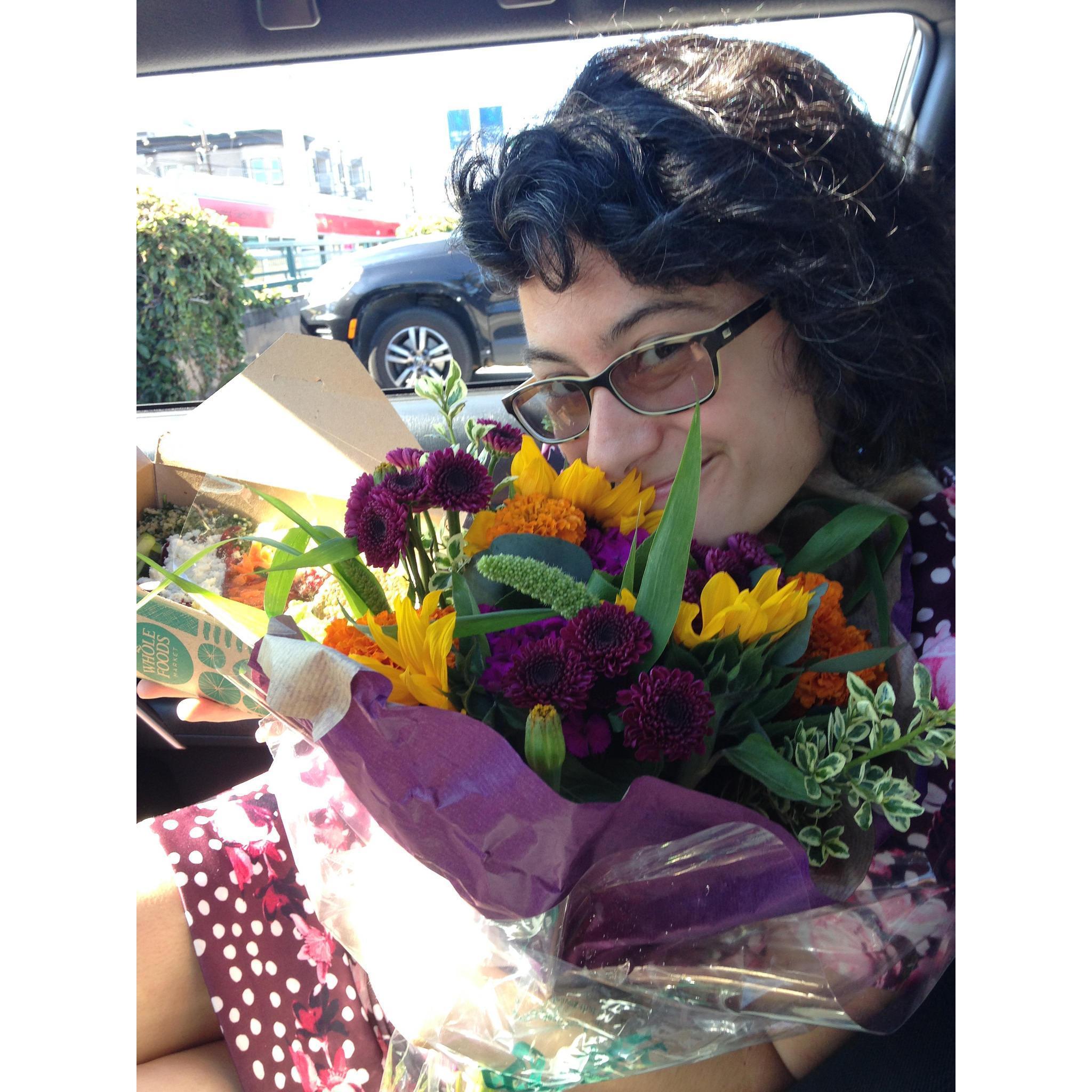 Sarah and her birthday flowers from Jess.