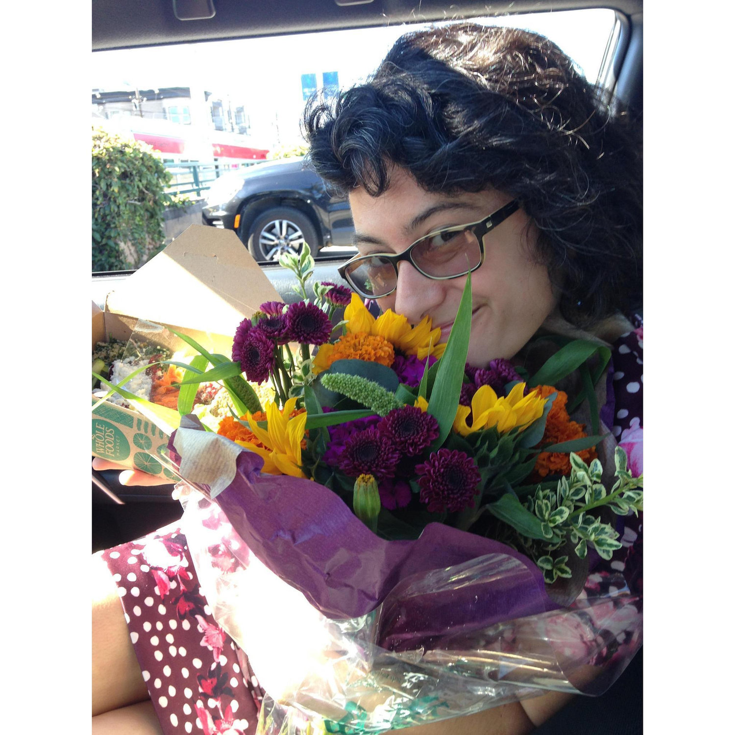 Sarah and her birthday flowers from Jess.