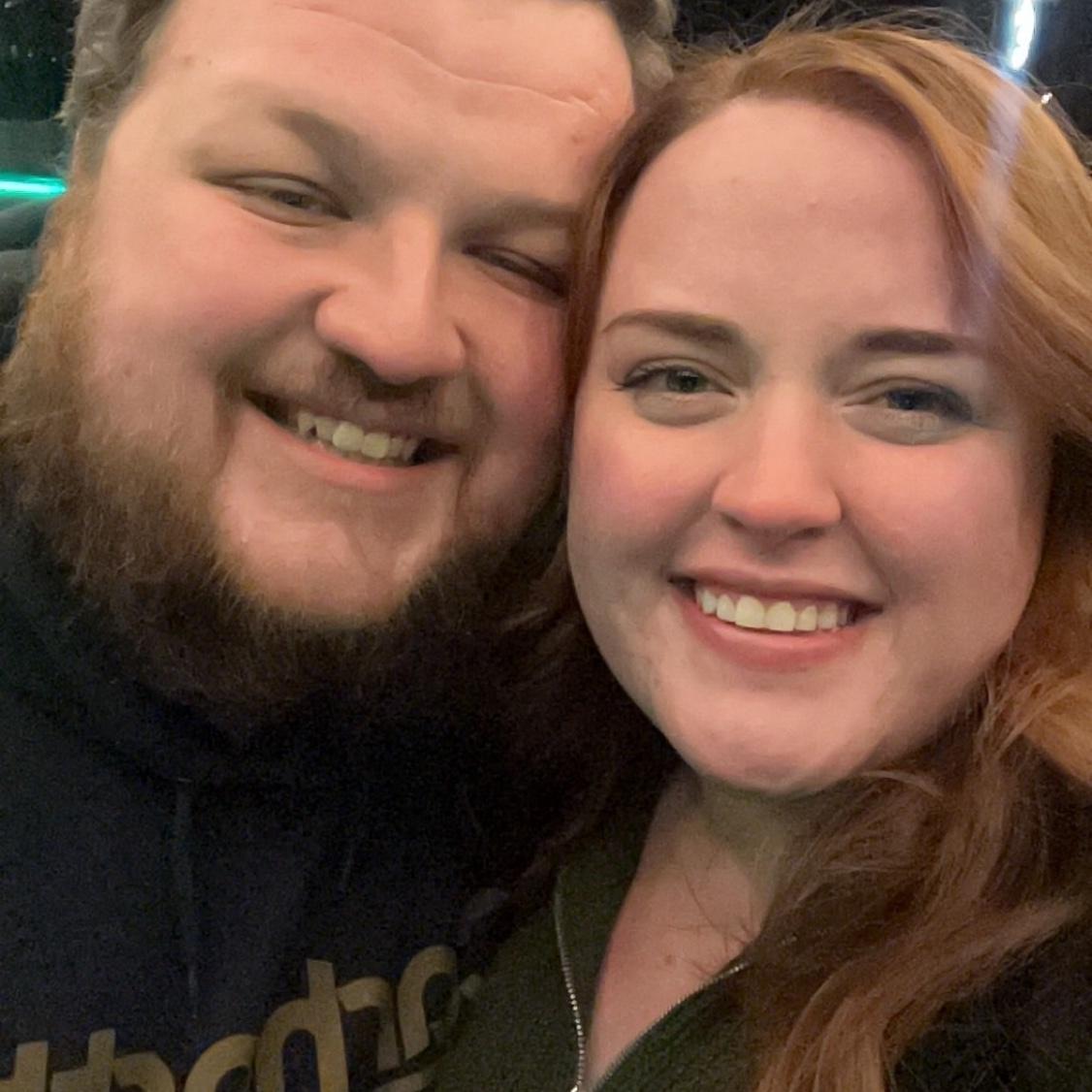 Our first picture as an engaged couple! Andrew proposed to Abi in downtown Noblesville. There was snow on the ground, and a horse-drawn carriage was going by. It was better than Abi ever dreamed of!