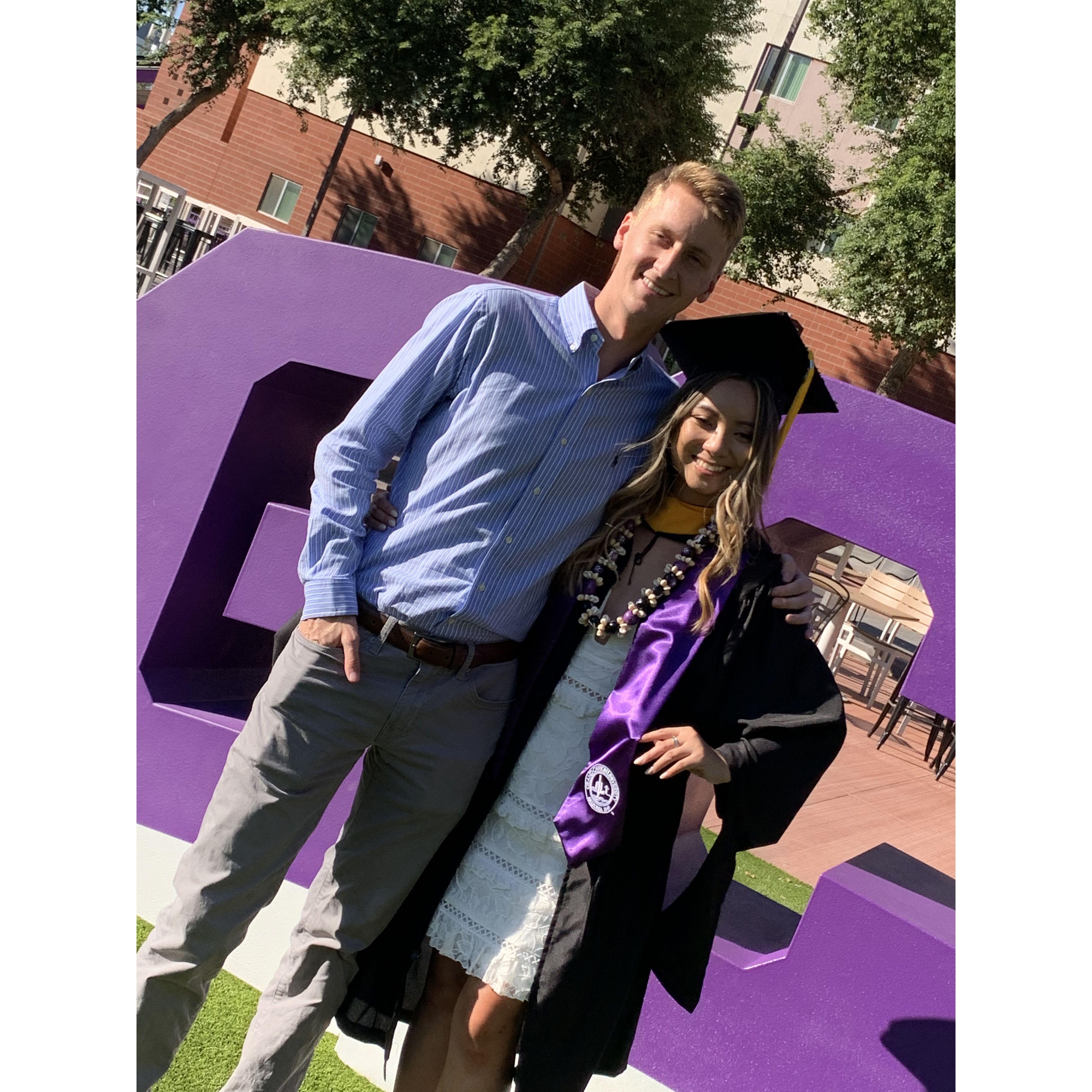 The one where I graduated with my masters. Ignore the sun in our eyes