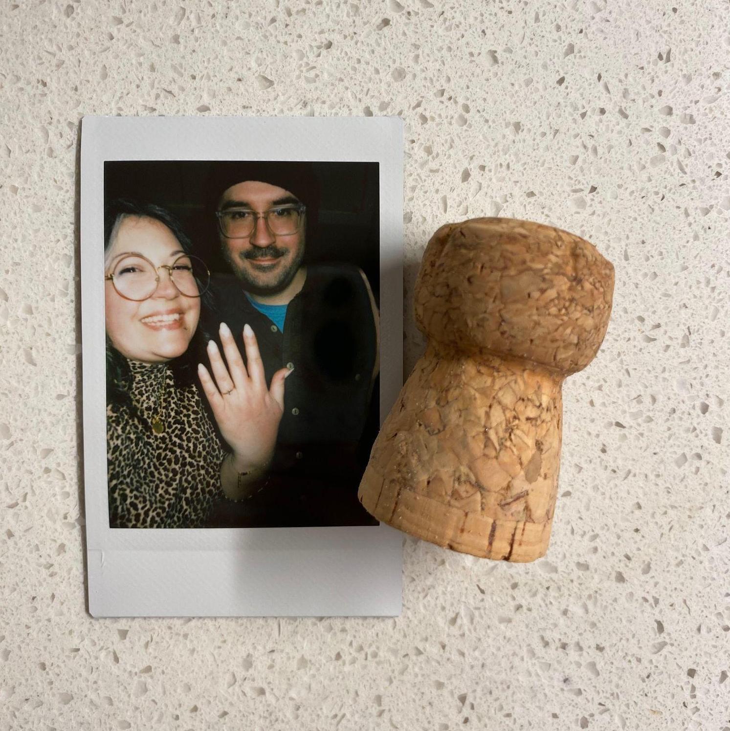 Us and the cork from the night we got engaged!