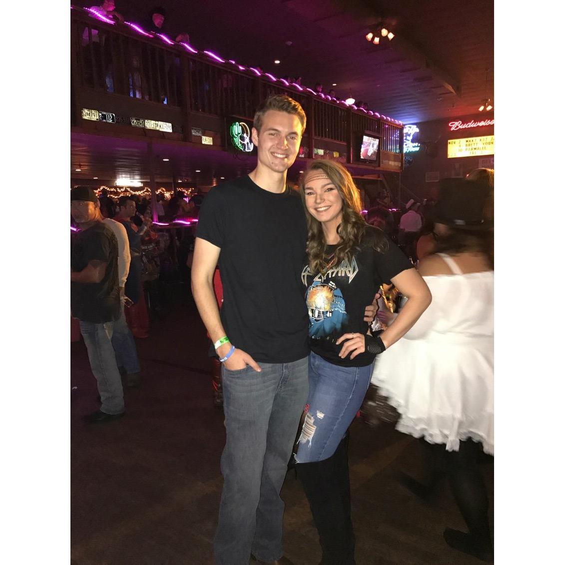 Halloween at Coyote Joes! Olivia went as an 80's rocker and Caleb went as a "young Johnny Cash."