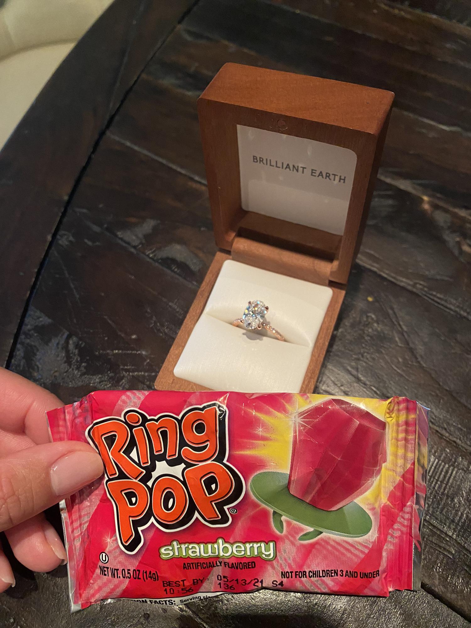 He proposed with our ring in this ring pop wrapper.. I gave him this ring pop in 2019 and told him when he's ready he can propose with it.  2 years later, he sure did!