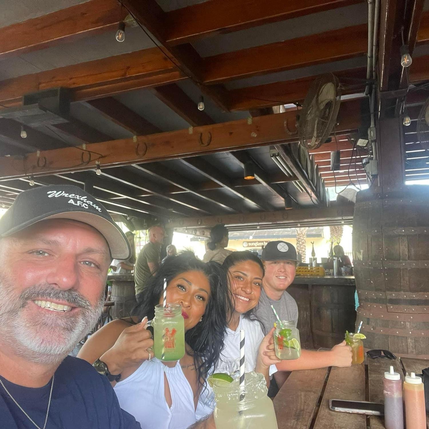 Hanging out with Kaitlyn's 
parents watching soccer at Smoking Rooster in the VI.