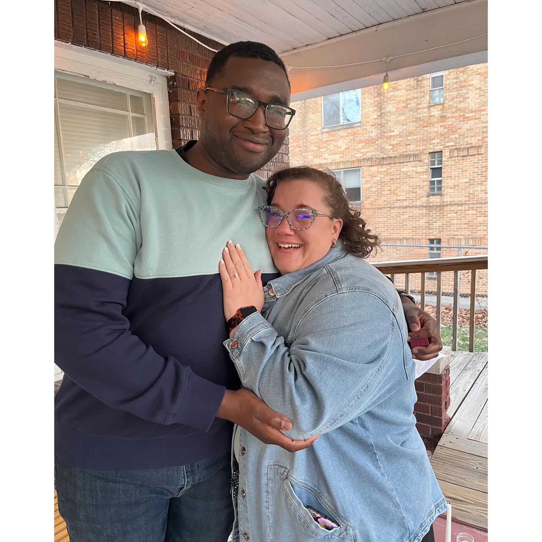 We didn't have to wait until Christmas to take more porch photos - Jaylyn proposed on March 16, 2024 on a beautifully decorated porch with their friends waiting inside.