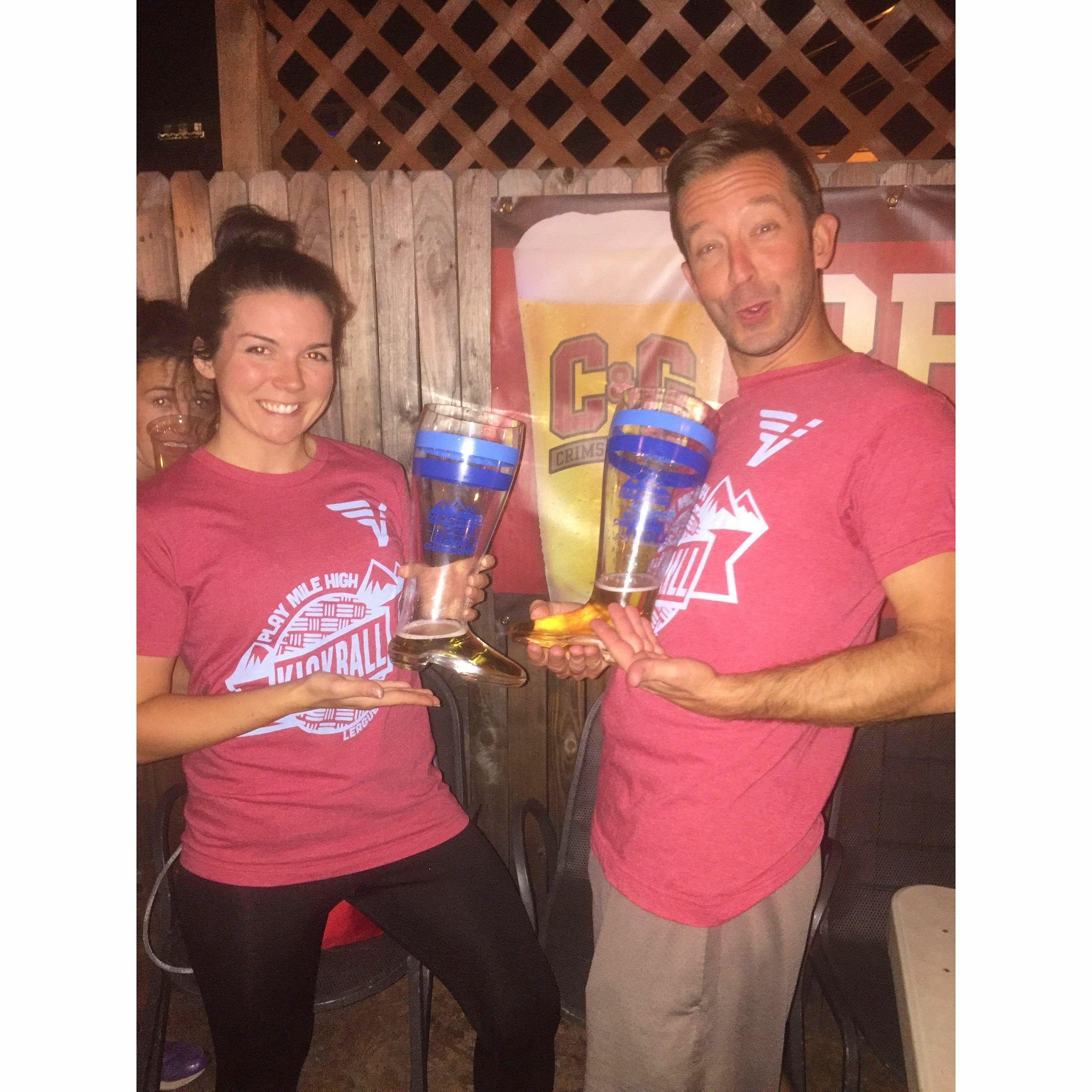 Holding our "Das Boot" trophies after the championship of our kickball league (2018)