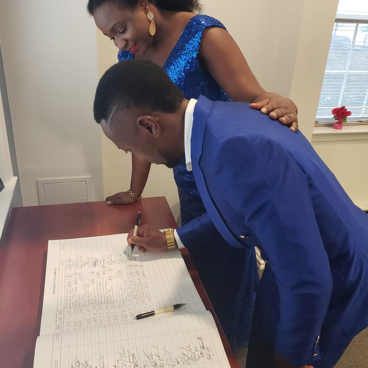 Signing our civil wedding some years back 🤭🤭
