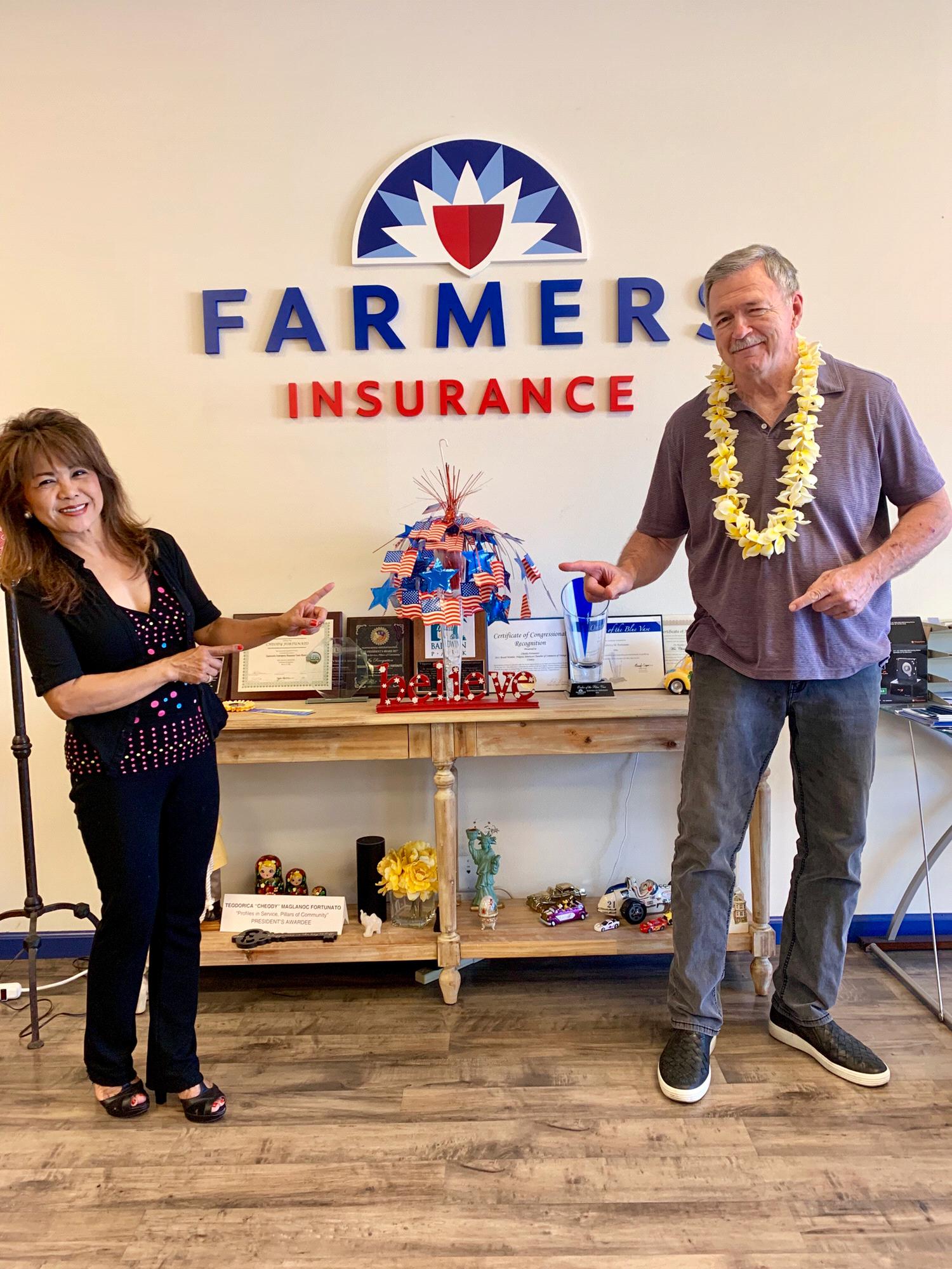 My Farmers office, Albert and Glenda Ujie's lei!