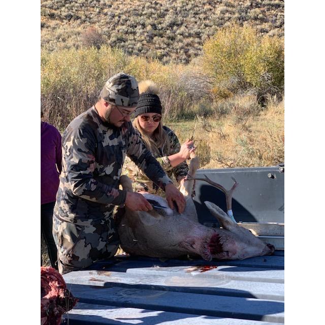 Cleaning Brandens deer after a good hunt!