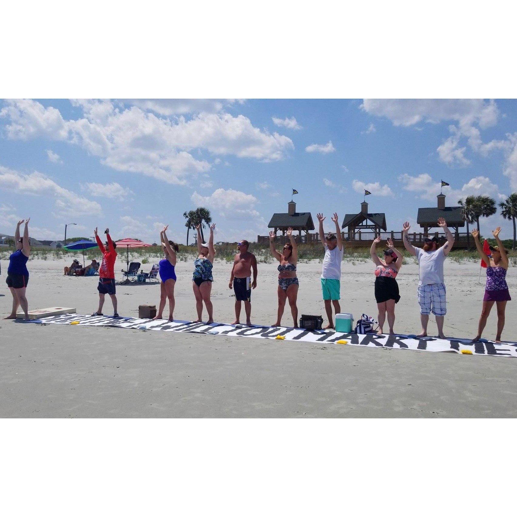 Our friends set up a huge banner that read 'Brittney will you marry me' that we could see from the air. Even a few strangers from the beach helped them pull it off!