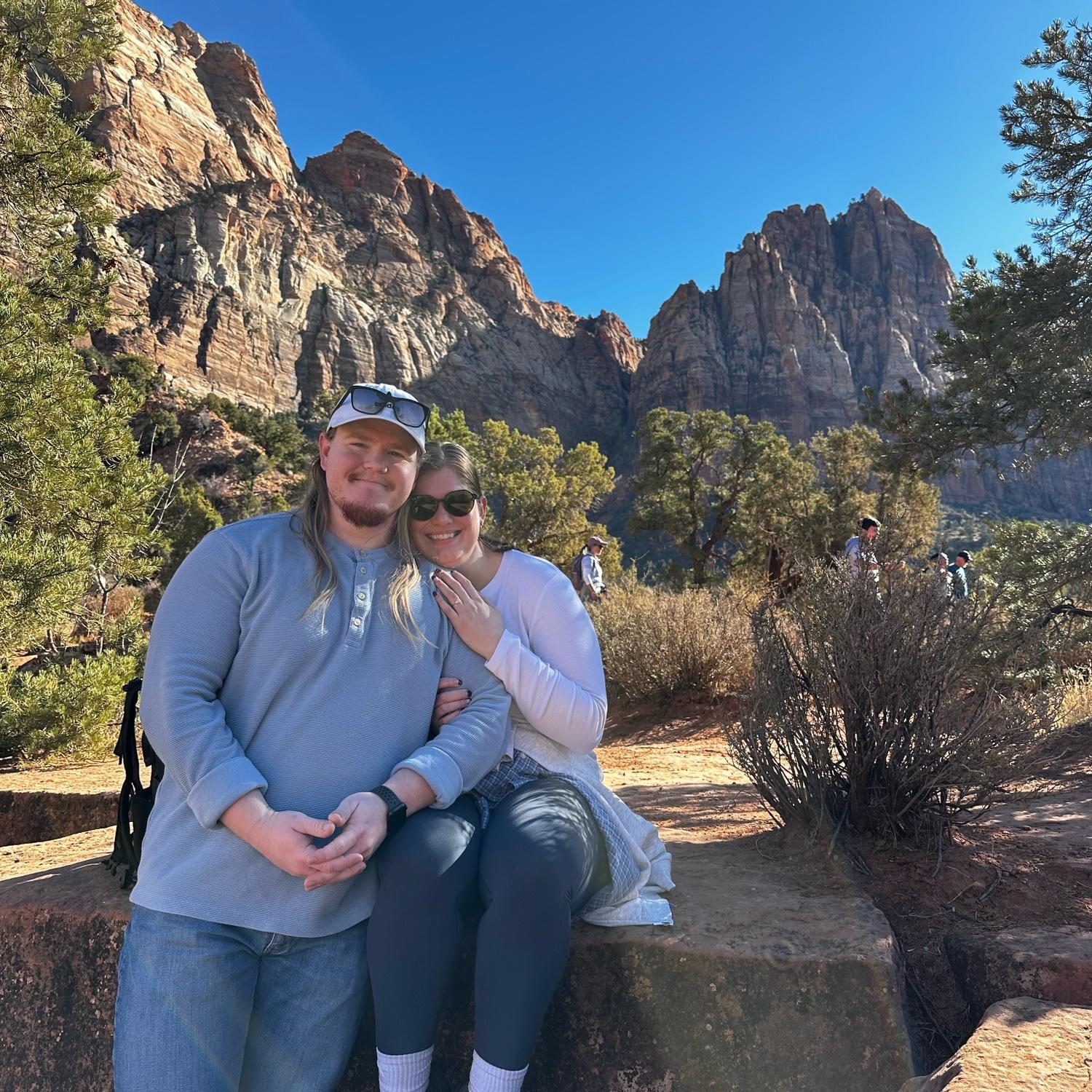 Garrett proposed to Malynn on top of the Watchman Trail at Zion National Park.