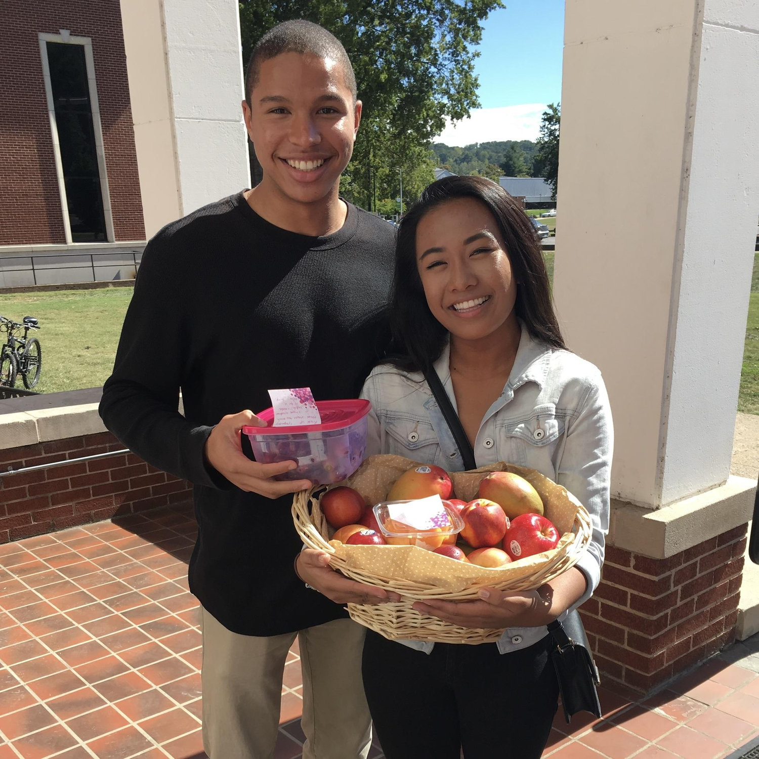 The couple’s first ever photo together in 2016, taken on Kurtis’ 19th birthday (the fruit basket was a hit!).