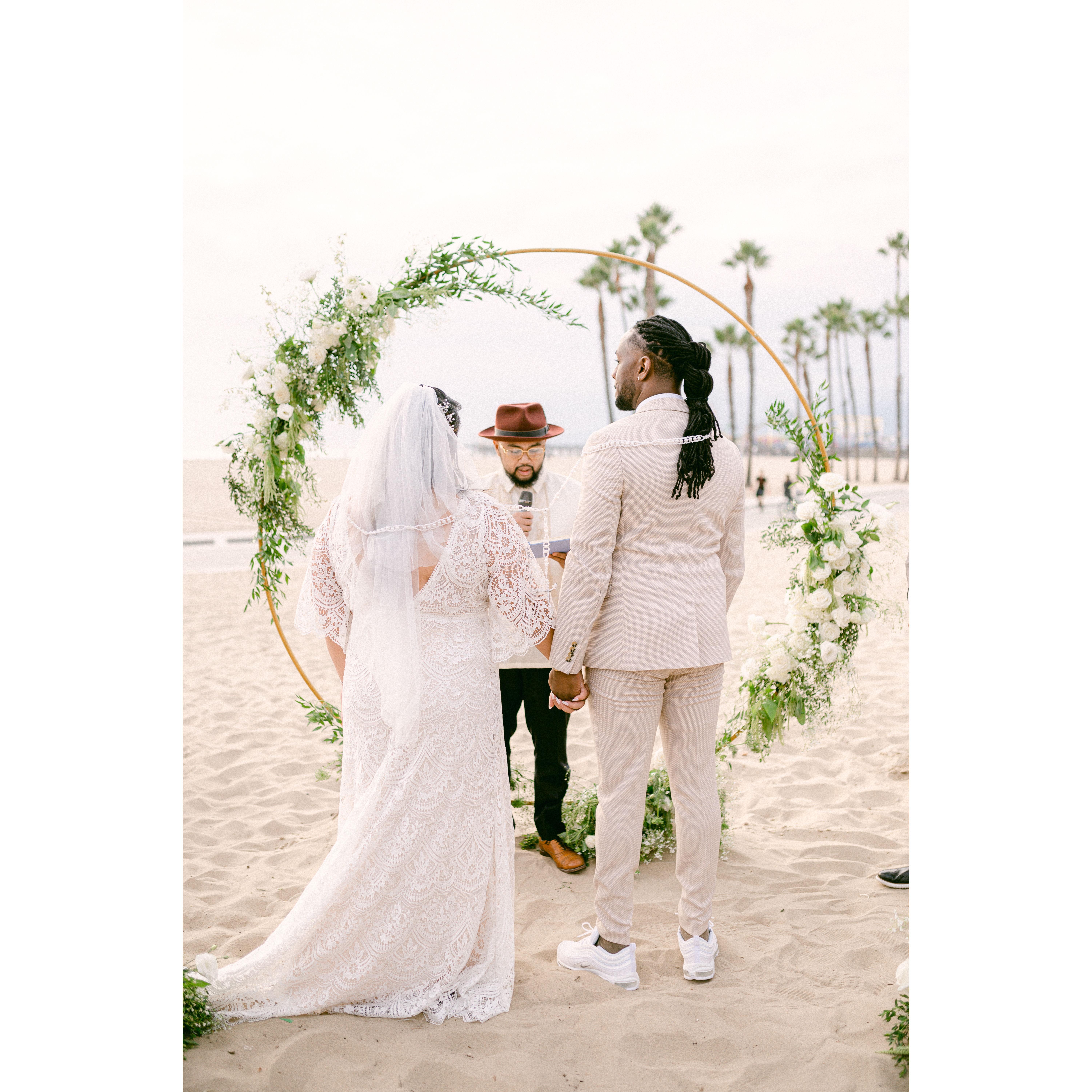 This knotted, infinity-shaped cord draped over the couple represents their bond and unity in marriage.