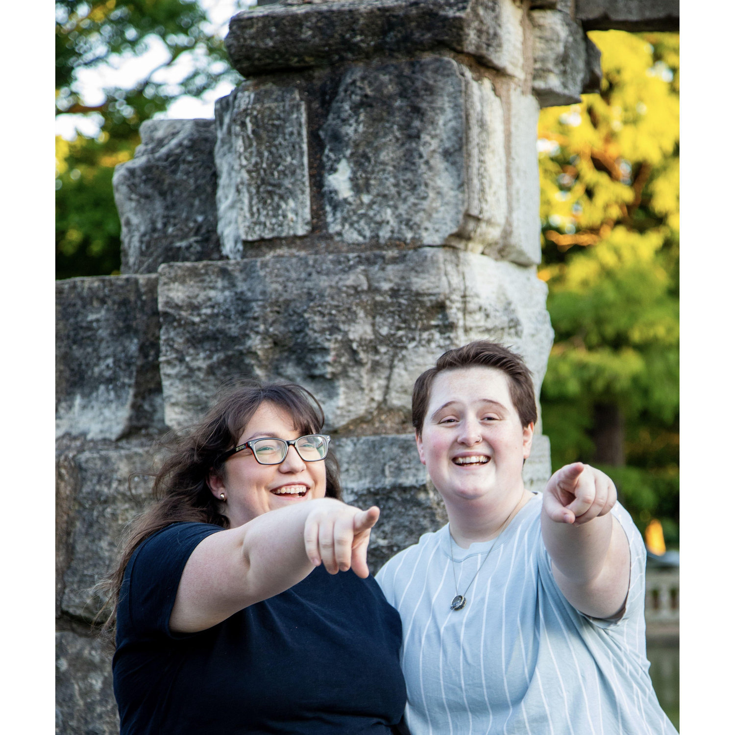 we had a photoshoot in Tower Grove Park in St. Louis! We aren't pointing at anything. -Carissa