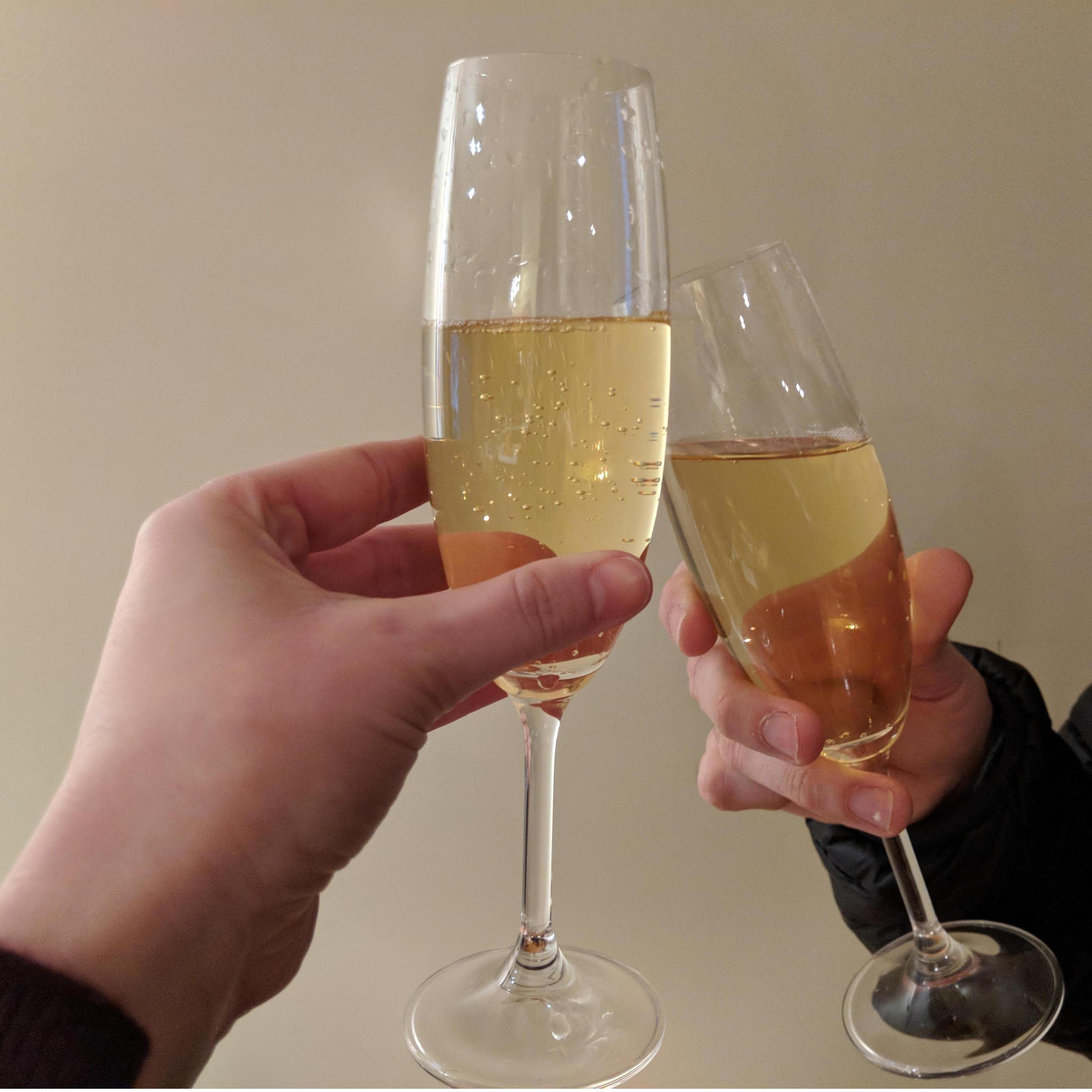 Cheers to purchasing our first home together! February 2018