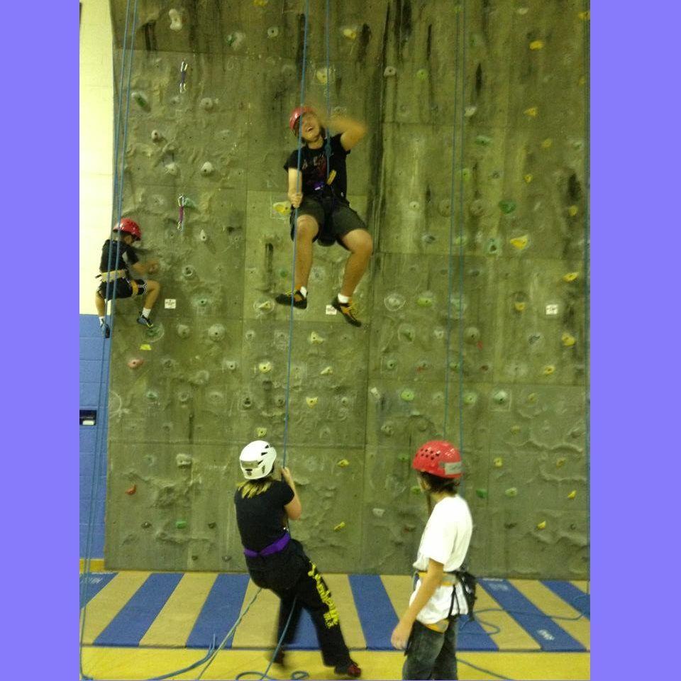 Anna belaying Marcel in England, probably also 2013