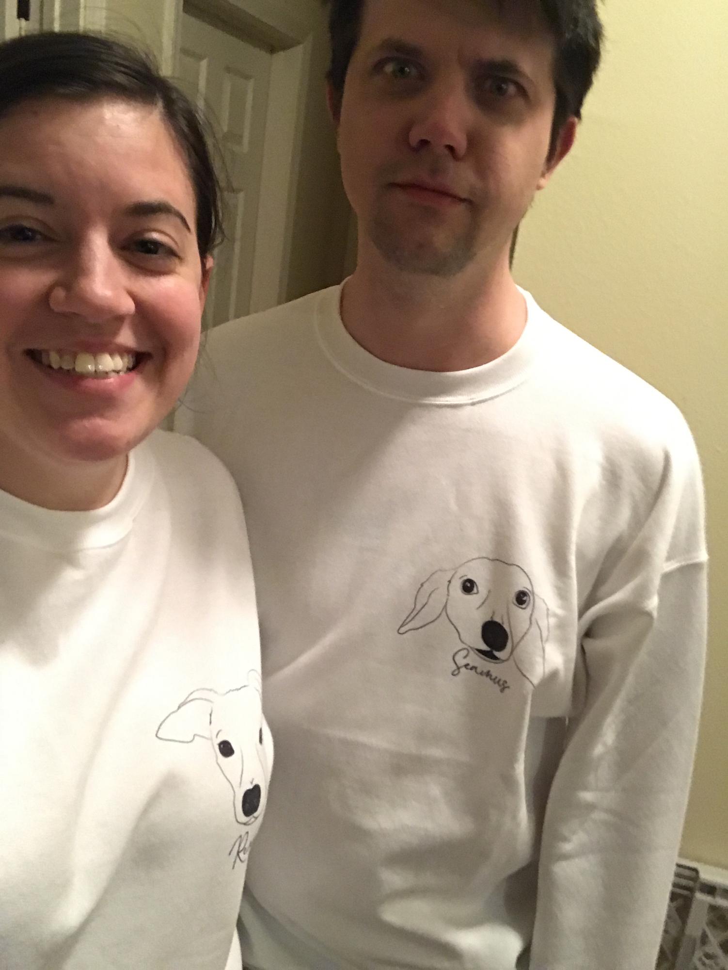 Laura got us coordinating sweatshirts with our dogs on them!