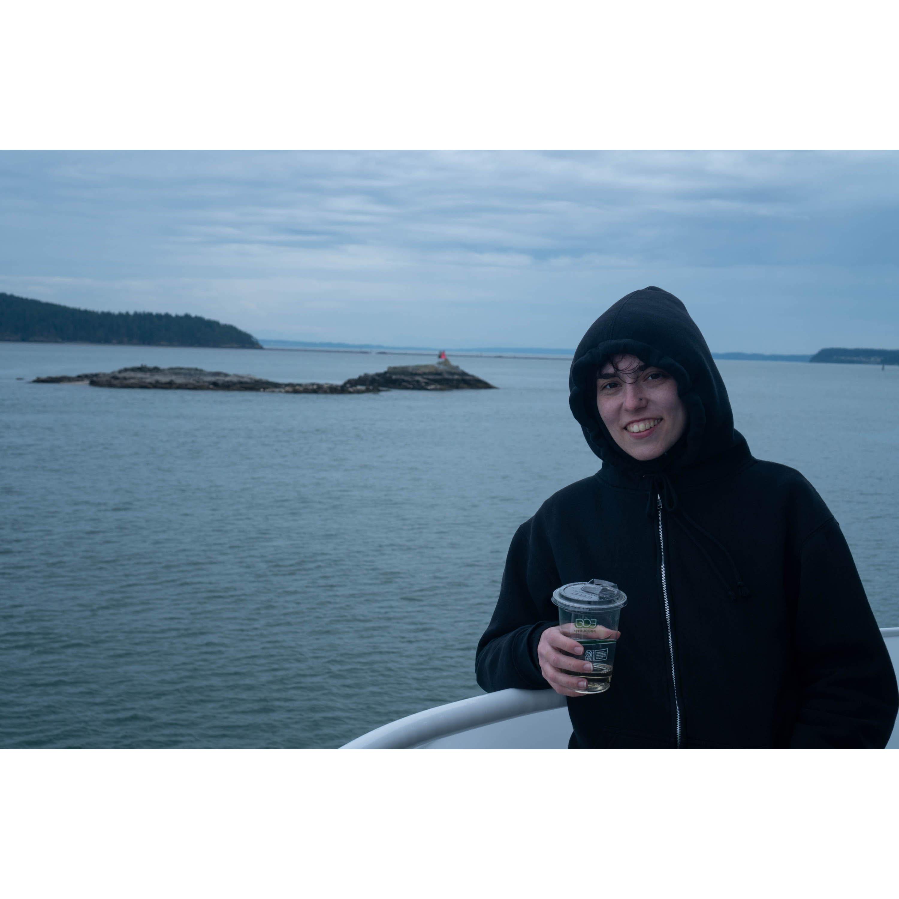 Rex drinking white wine on the whale watching boat (they sold wine in sippy cups on the boat)