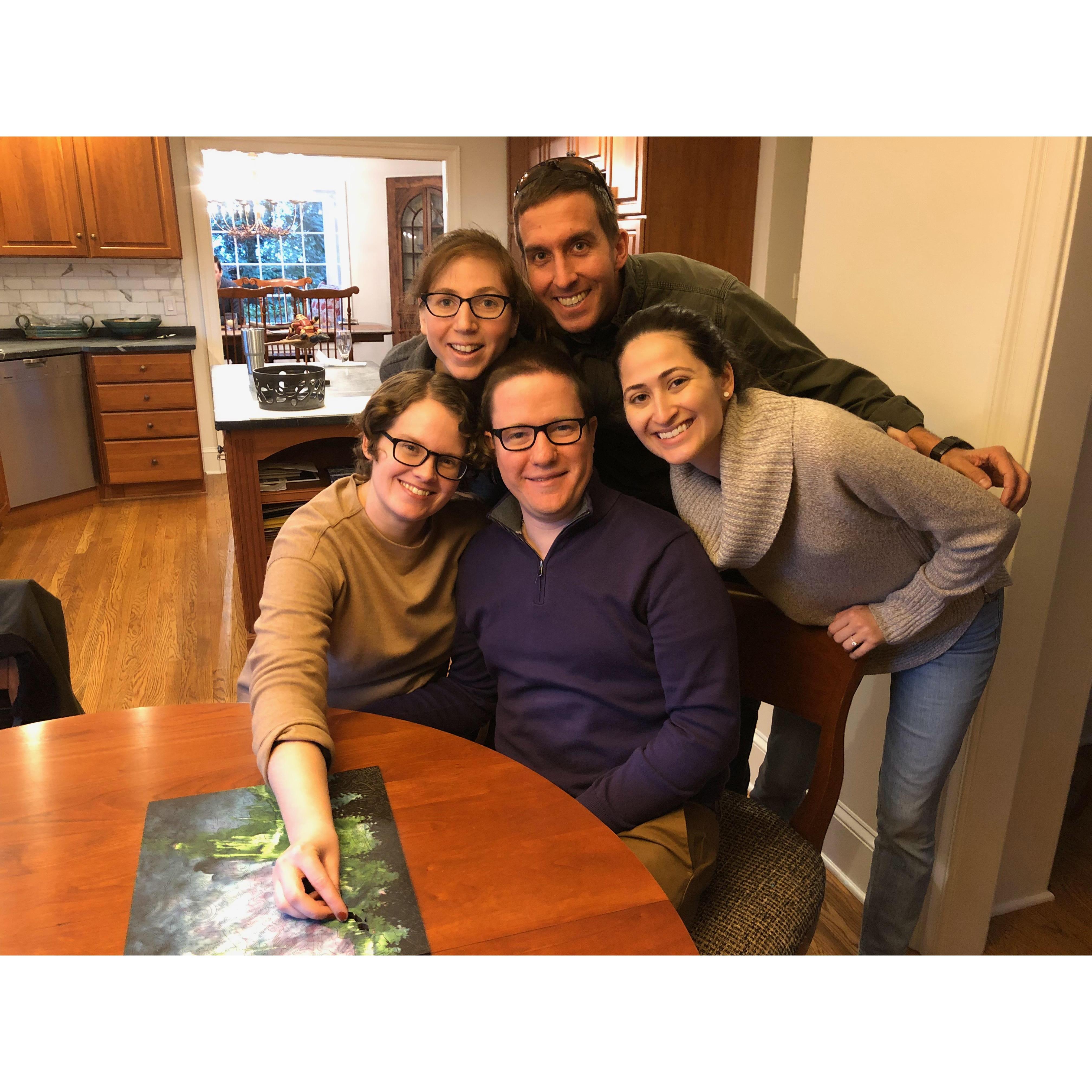 Finishing a puzzle with the Hagerty siblings during Christmas 2018