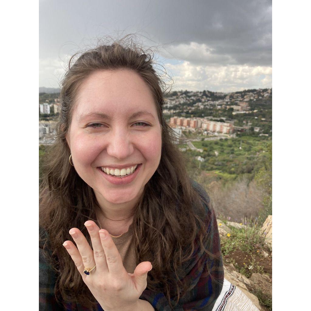 She said yes (despite the thunderstorm)!