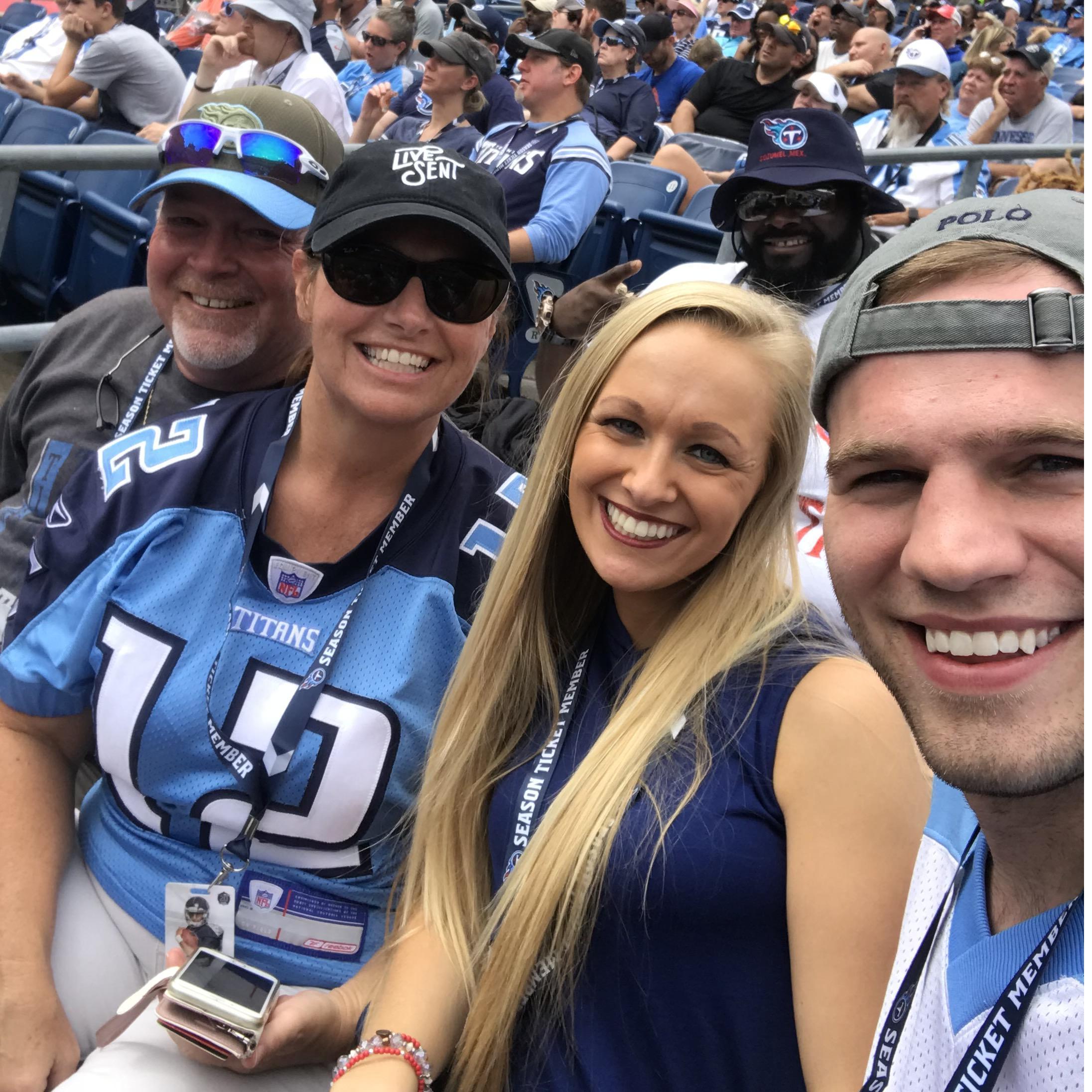 Our 1st Titans game together with Chase's parents! (& the funny photo bomber HA!)