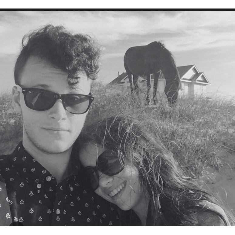 The Outer Banks, NC. Wild horses roam freely through the area and sometimes even photobomb people!