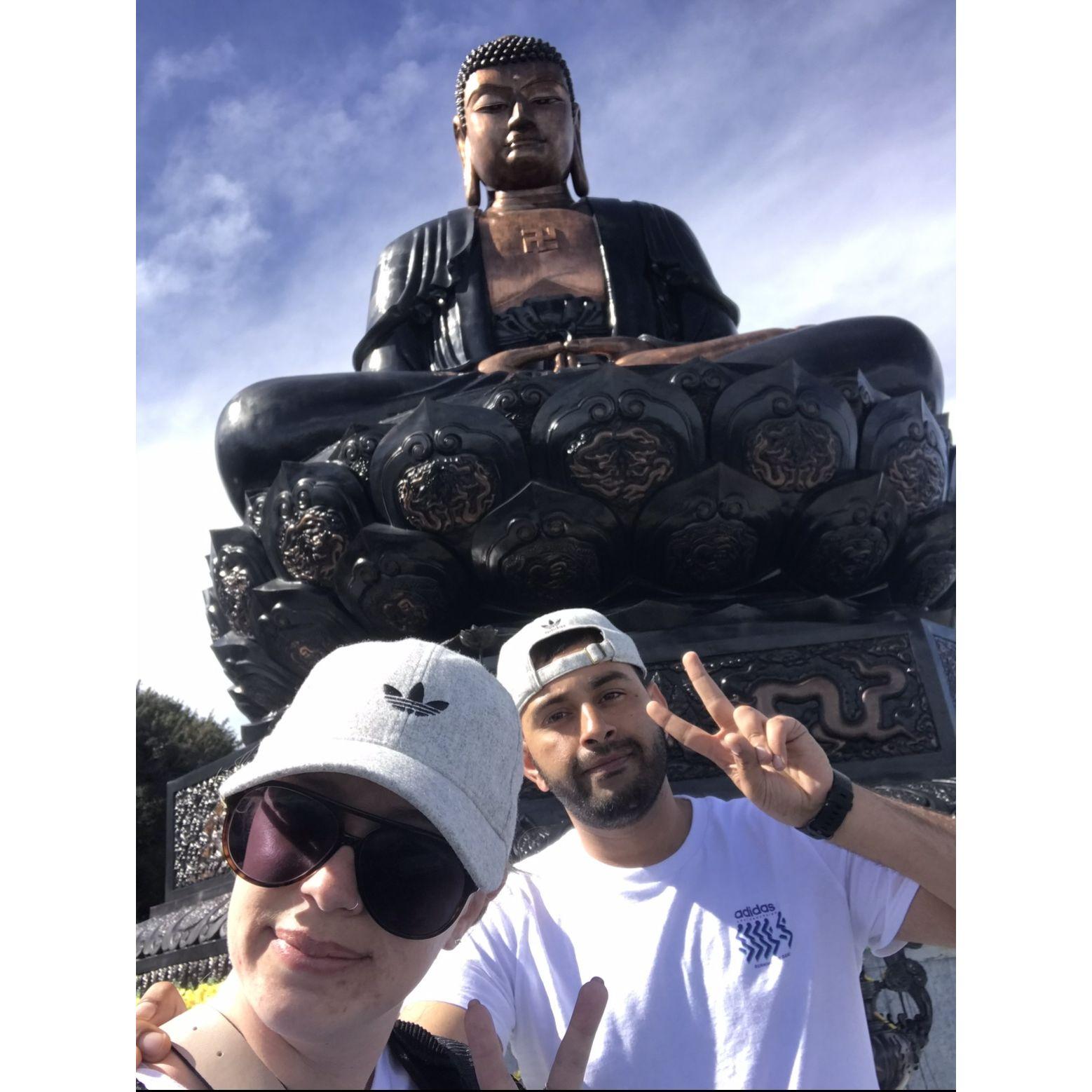 Smiling from 10,000 feet above at the summit of Mt. Fansipan in Vietnam. Hello there Buddha!