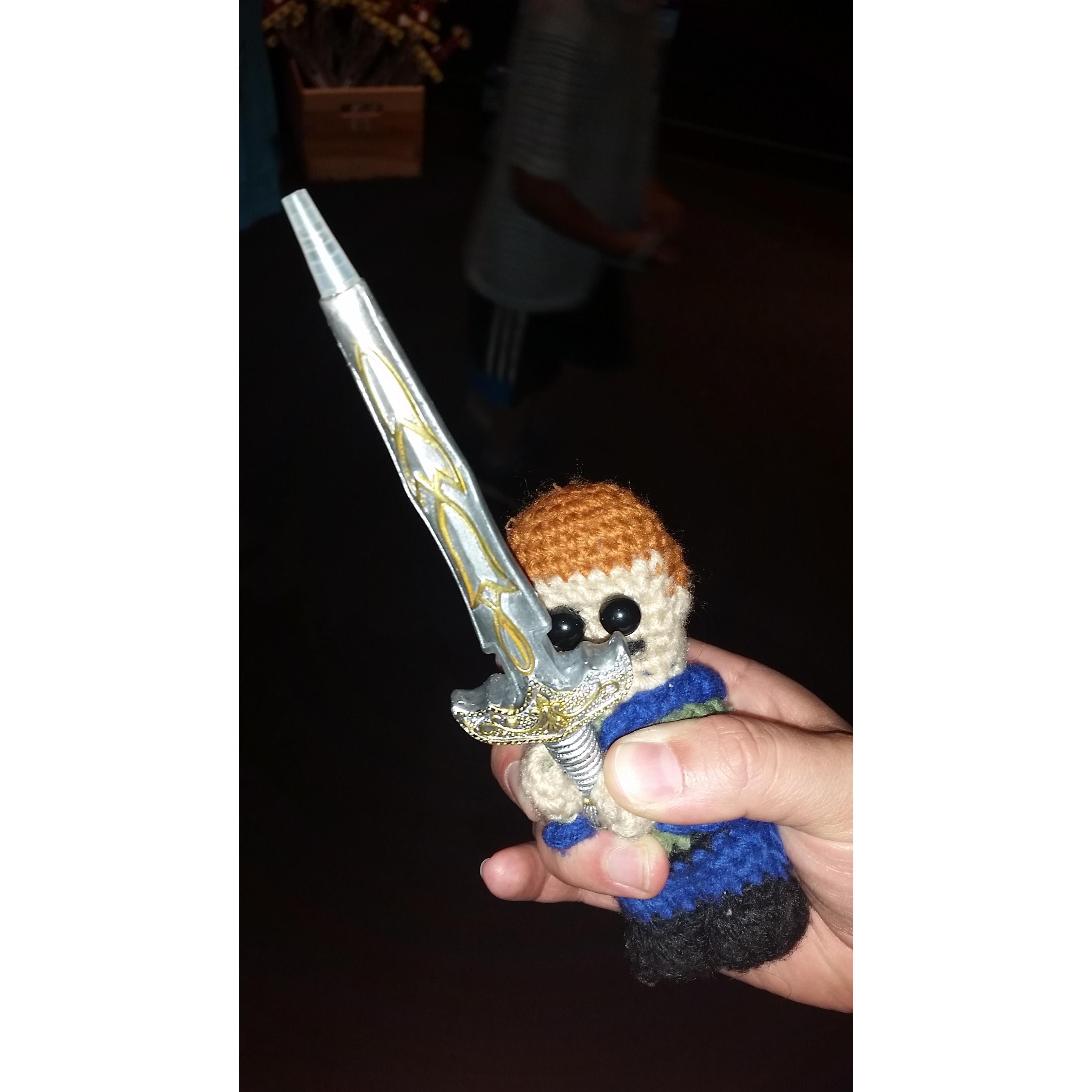 Even Tiny Eric loves swords!!!