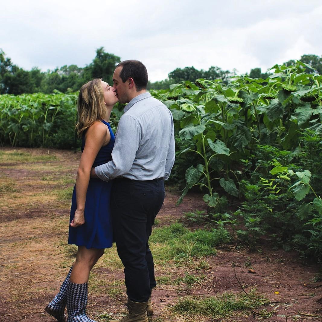 We took our engagement photos before Josh's deployment in a field of (rained out) sunflowers