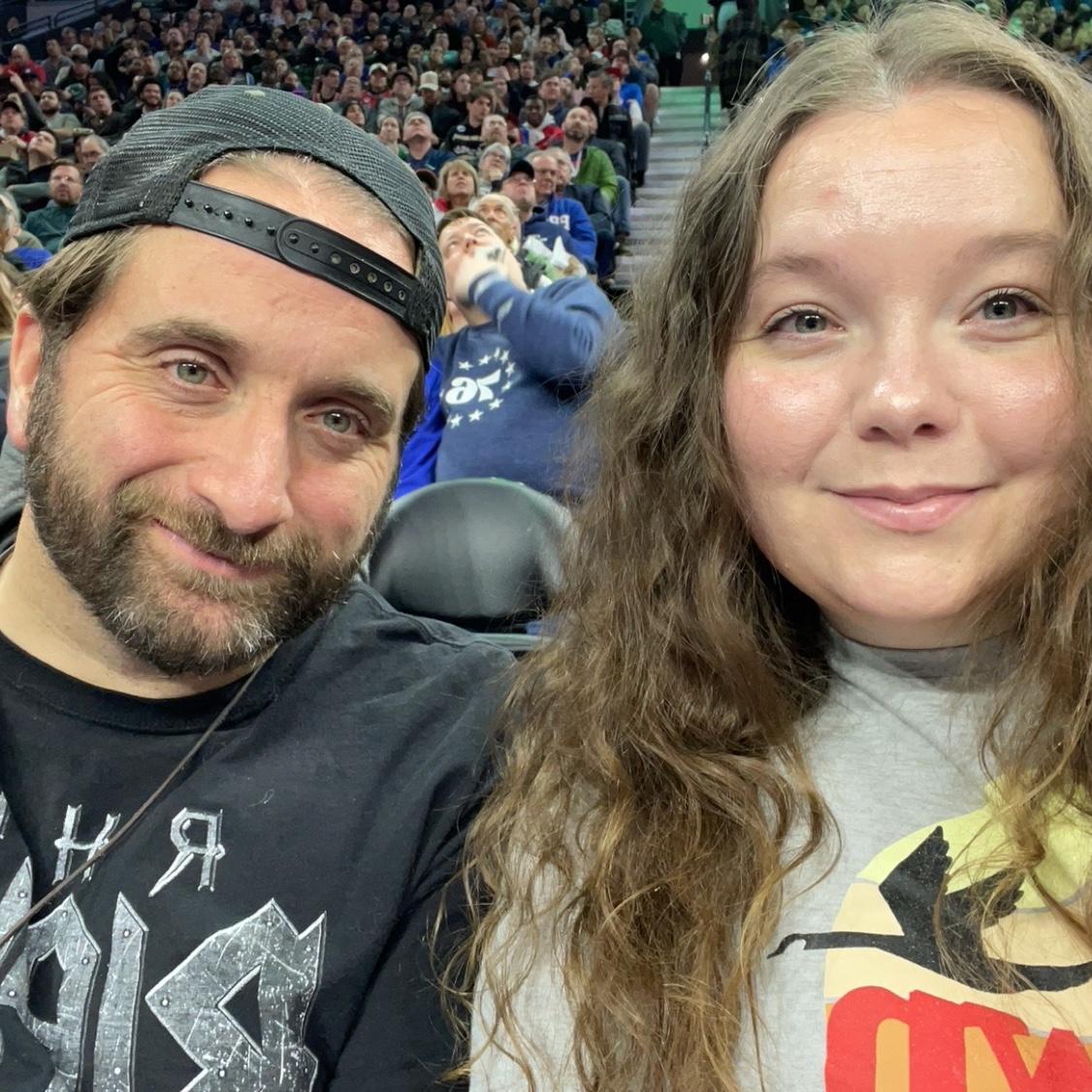 Court side seats at a Sixers game together