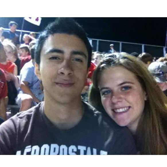 Our very first photo together in 2011 and Marco's first American football game/homecoming.  The bride's all time favorite photo!