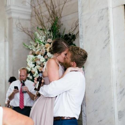 Post bouquet catch at their best friend's wedding in Atlanta