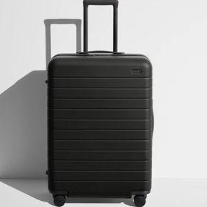 Browse Medium Suitcases in Jet Black | Away