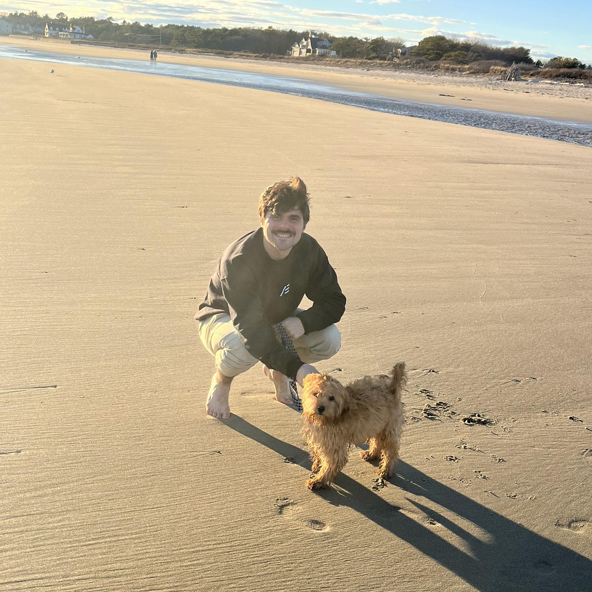 James and Twigs on the beach. This was Twigs' first time on the beach and it was October, so James' feet were purple by the end of the day