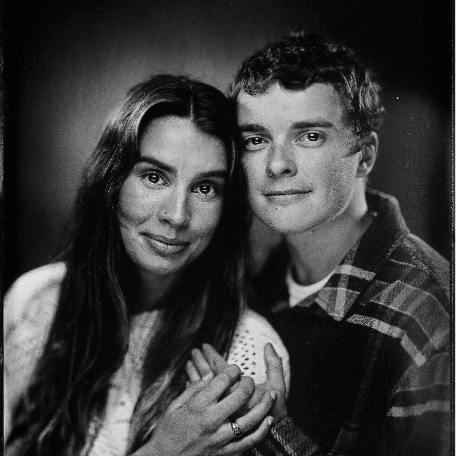 For our engagement photos, we chose to get tin-type photos taken. The photographer took the pictures on an old camera and then developed them on tin.