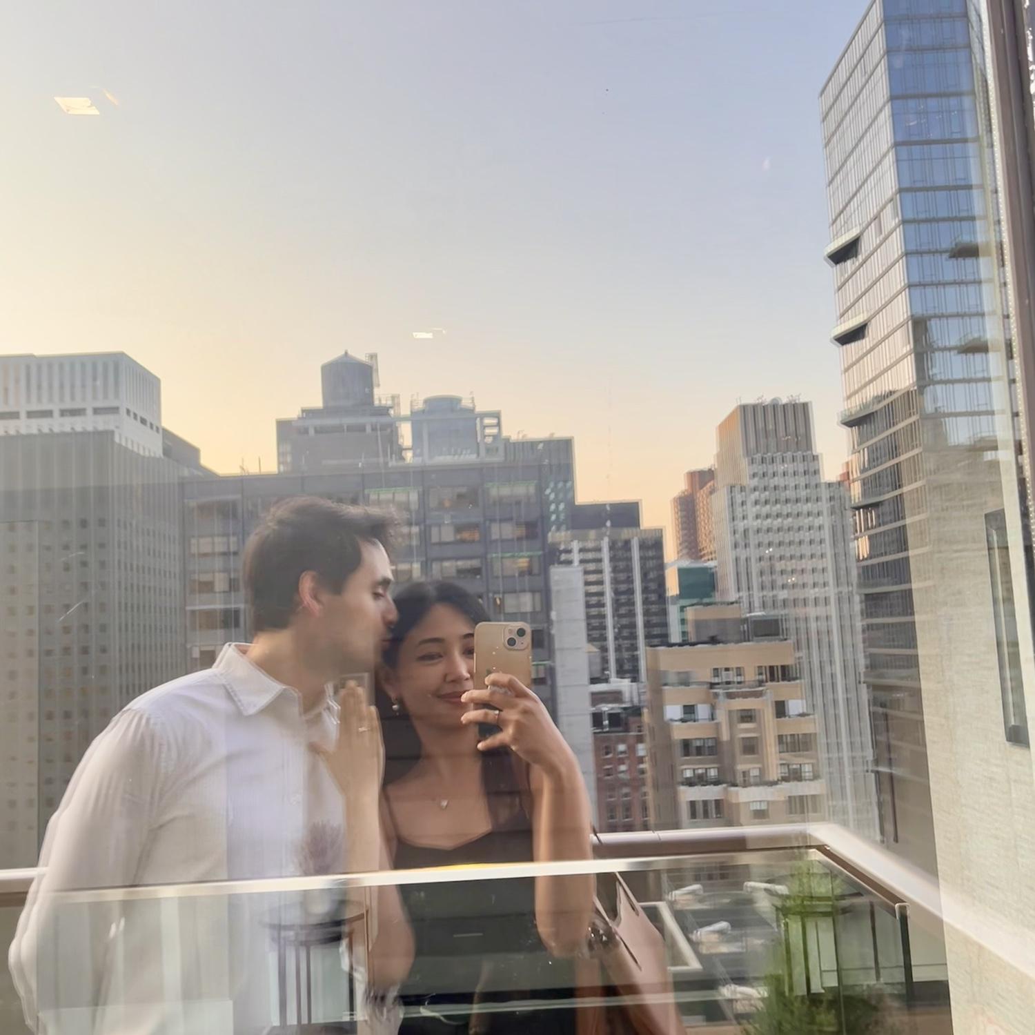 Newly engaged, with the ring, and right where it all began.