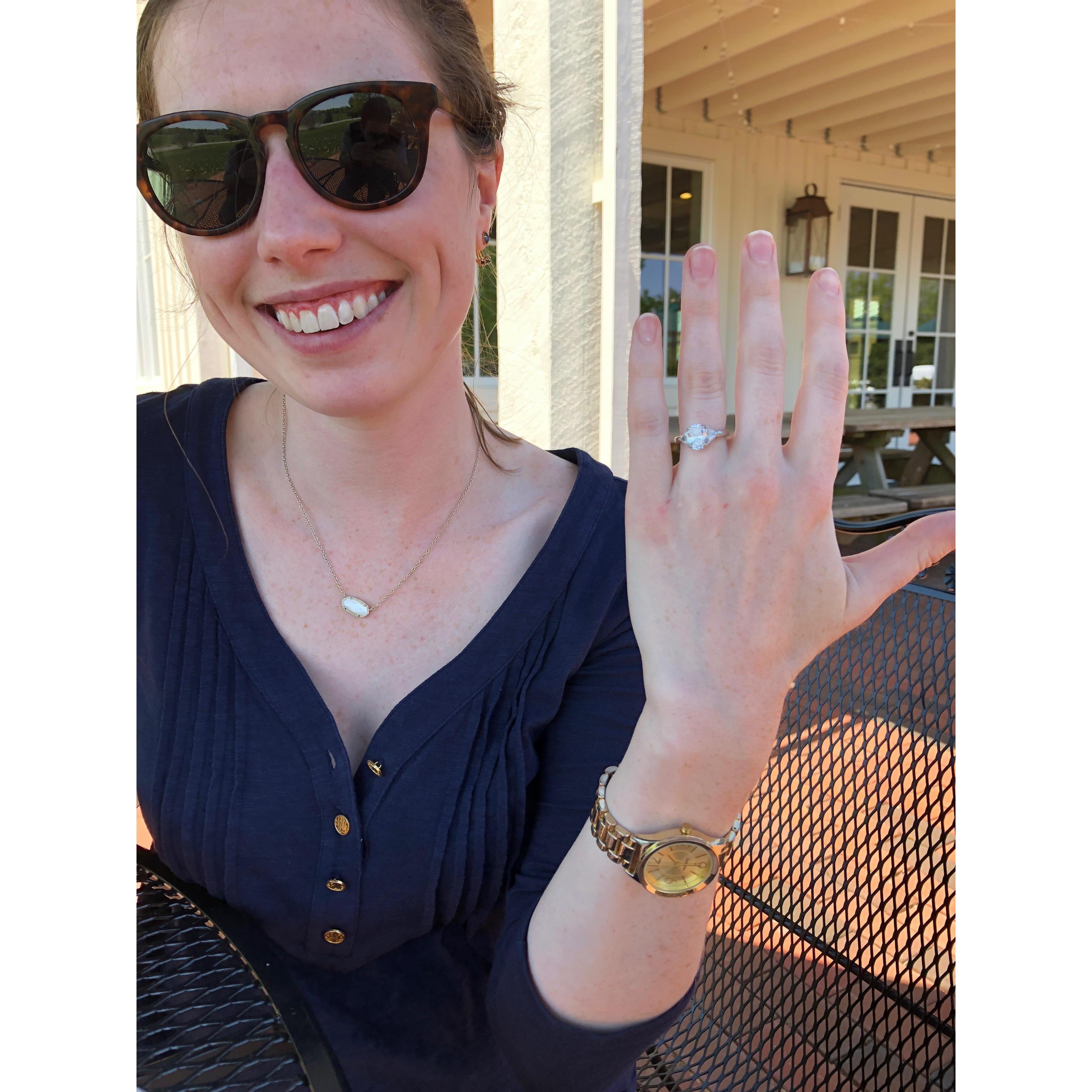 Showing off her ring for the first time