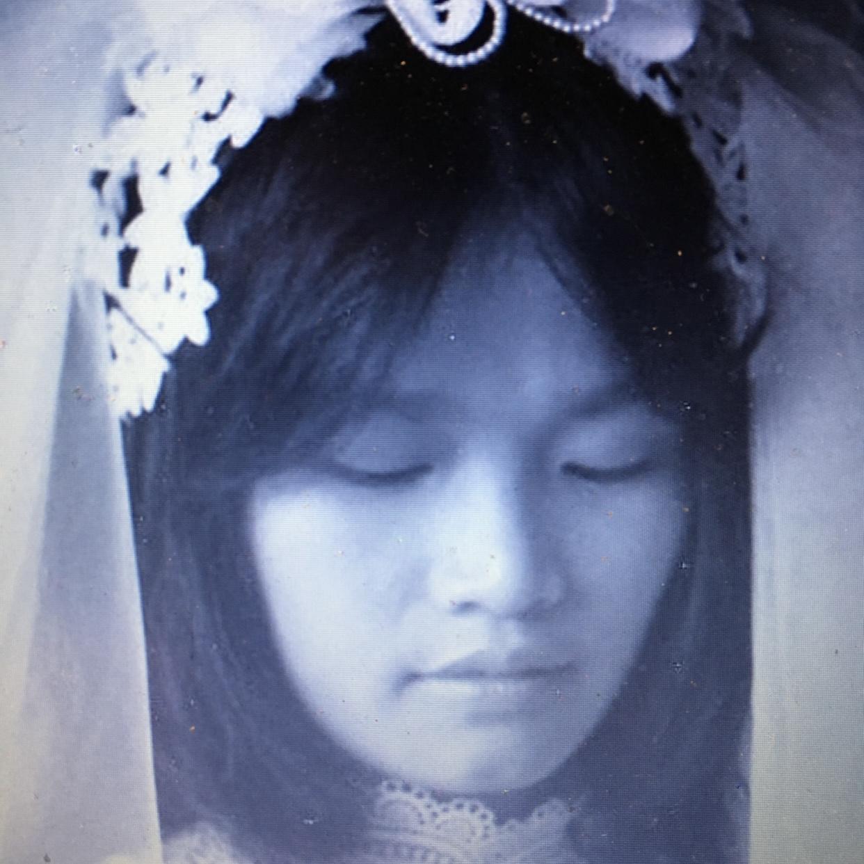 Saddest bride ever. Since my parents chose not to attend the wedding (dad took my mom to Venezuela), I showered and donned my gown. I didn’t fix hair and definitely no facial makeup. Oh well!