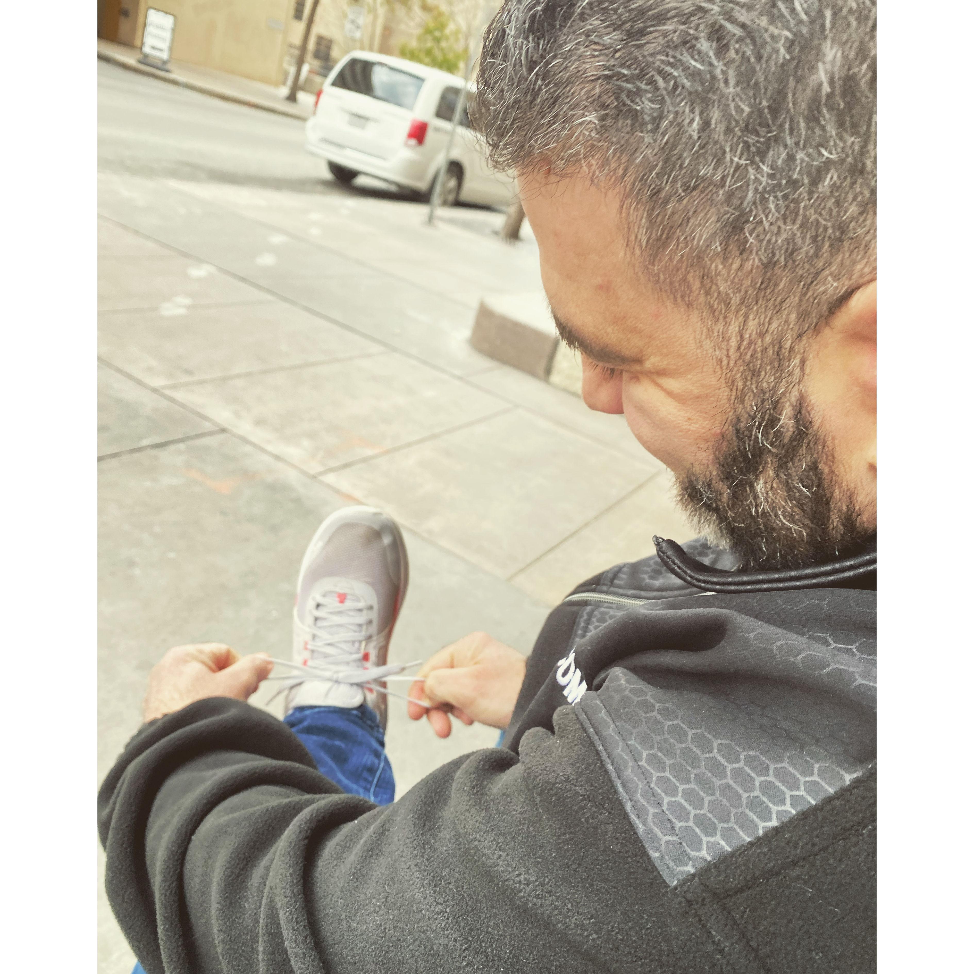 Carlos tying my shoe...true love.