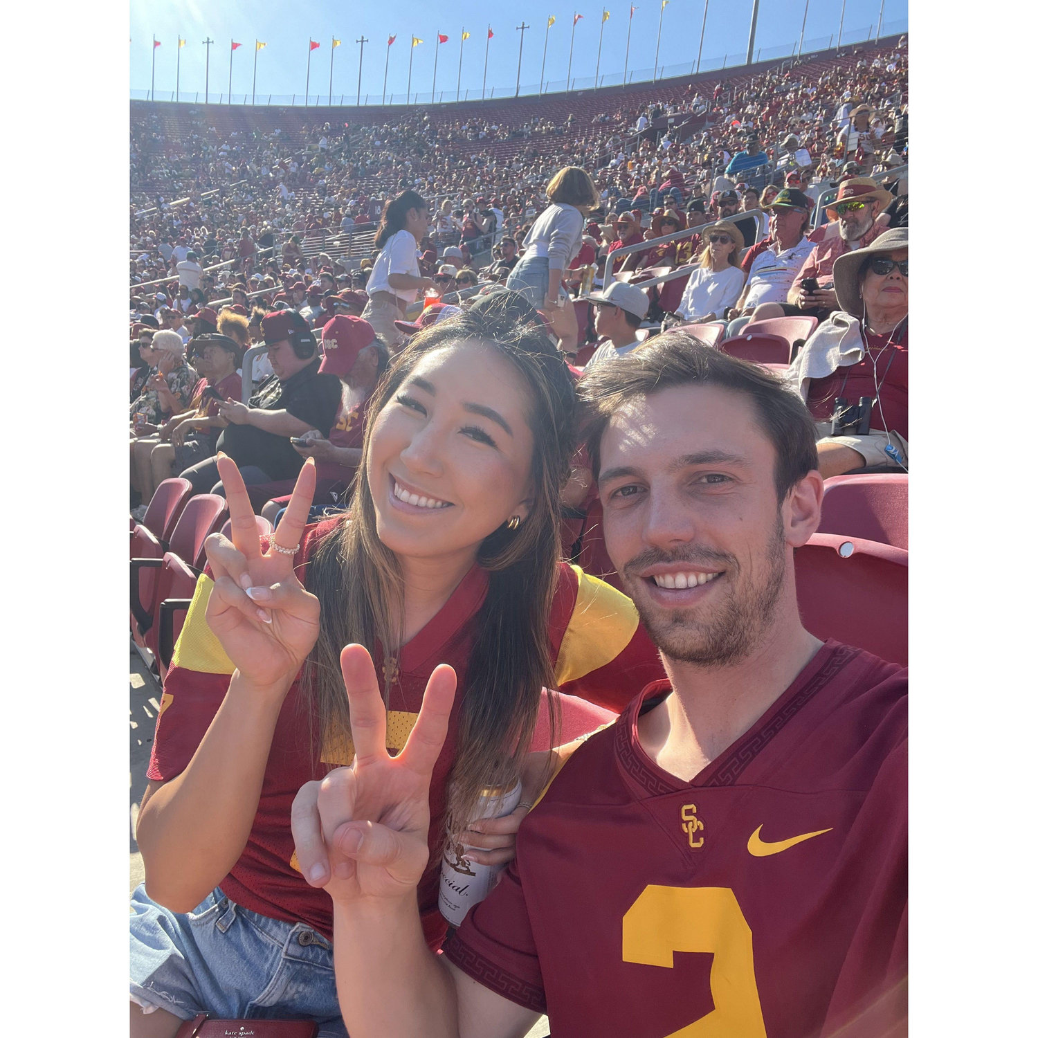 As alumni, we are even bigger USC football fans than when we were college students - this is us at the first game of the 2025 season, where we beat MO State 73-13!