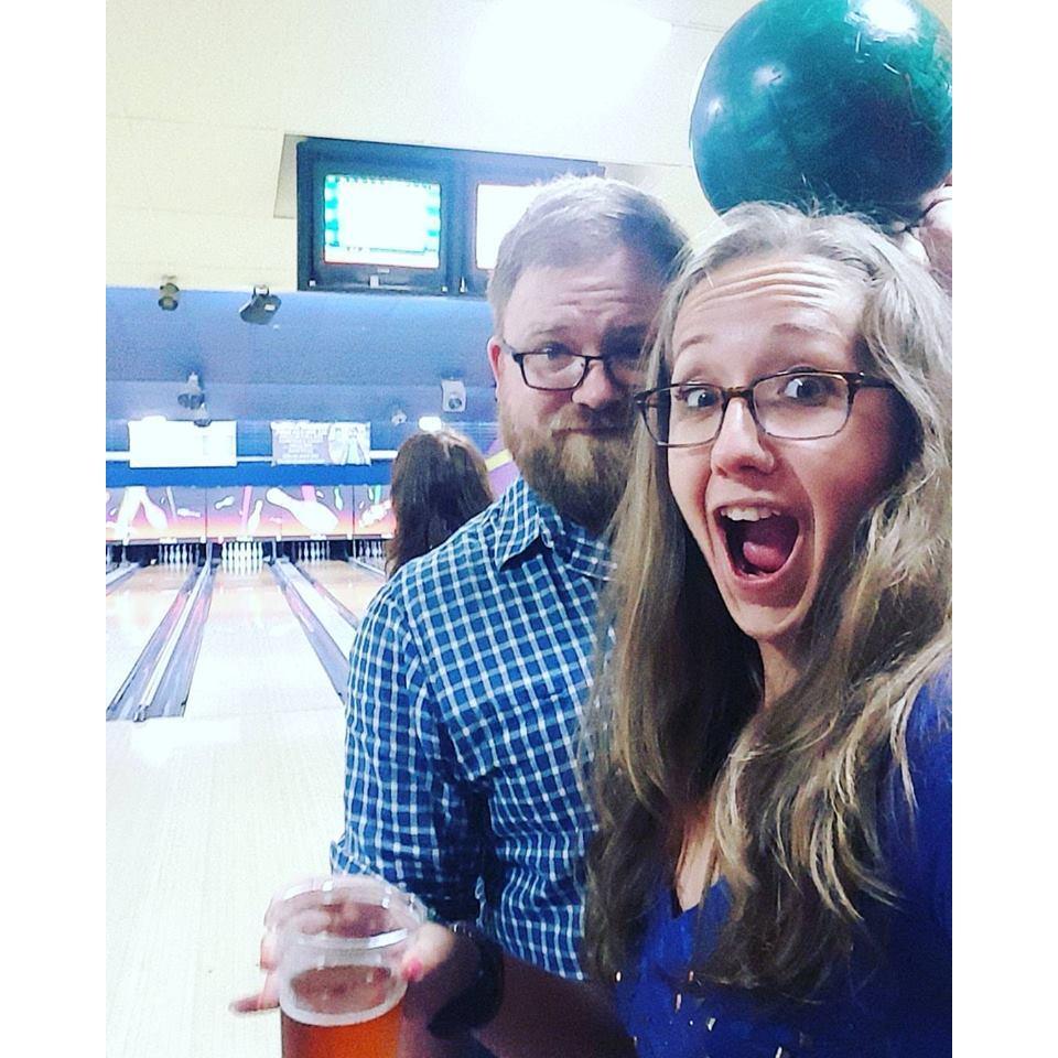 Goofing around while bowling with mom
