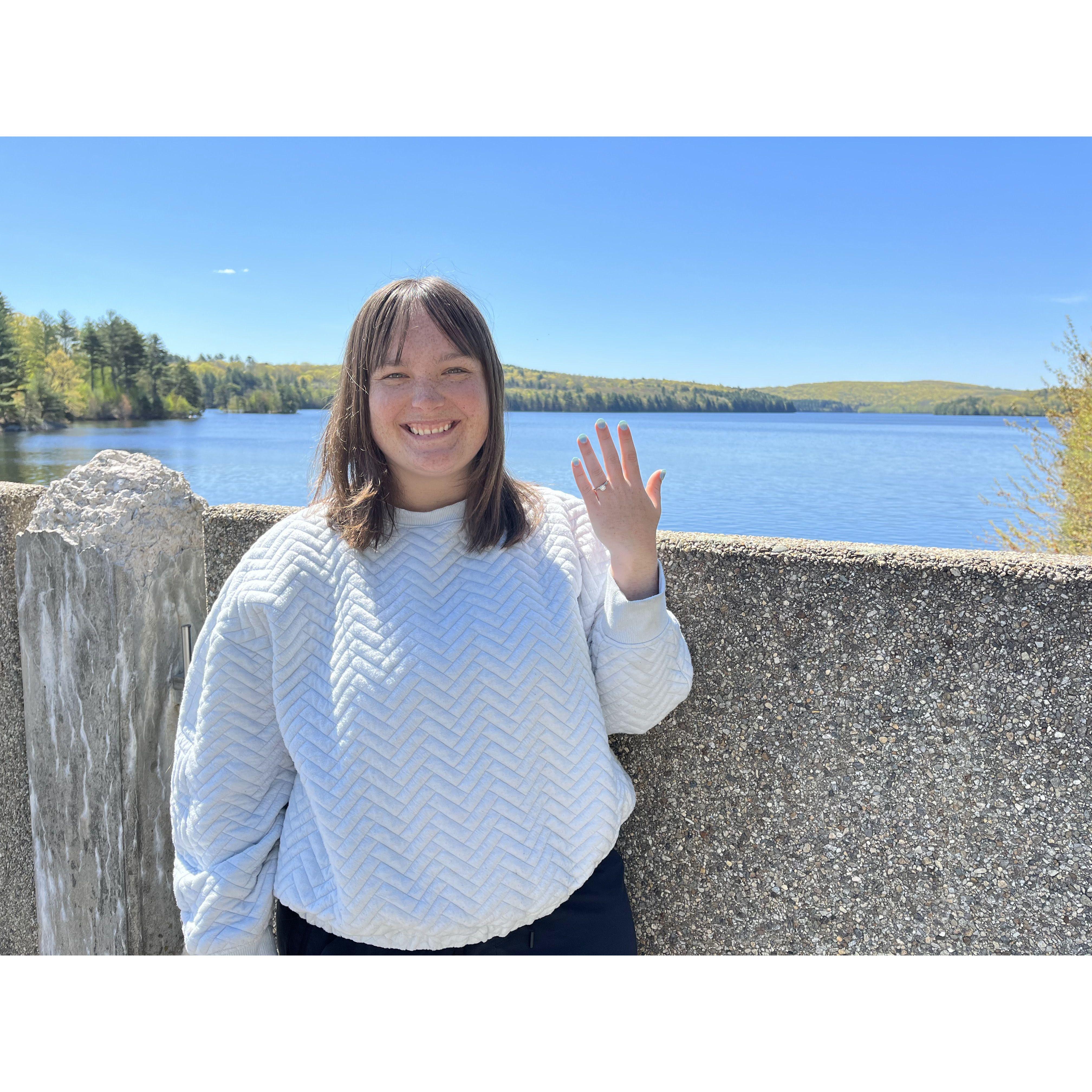 Ben proposed on a walk along a reservoir. I was taken by surprise when looking over the edge and staring at the waterfall. I couldn't believe it was happening and kept saying, "Right Now?".